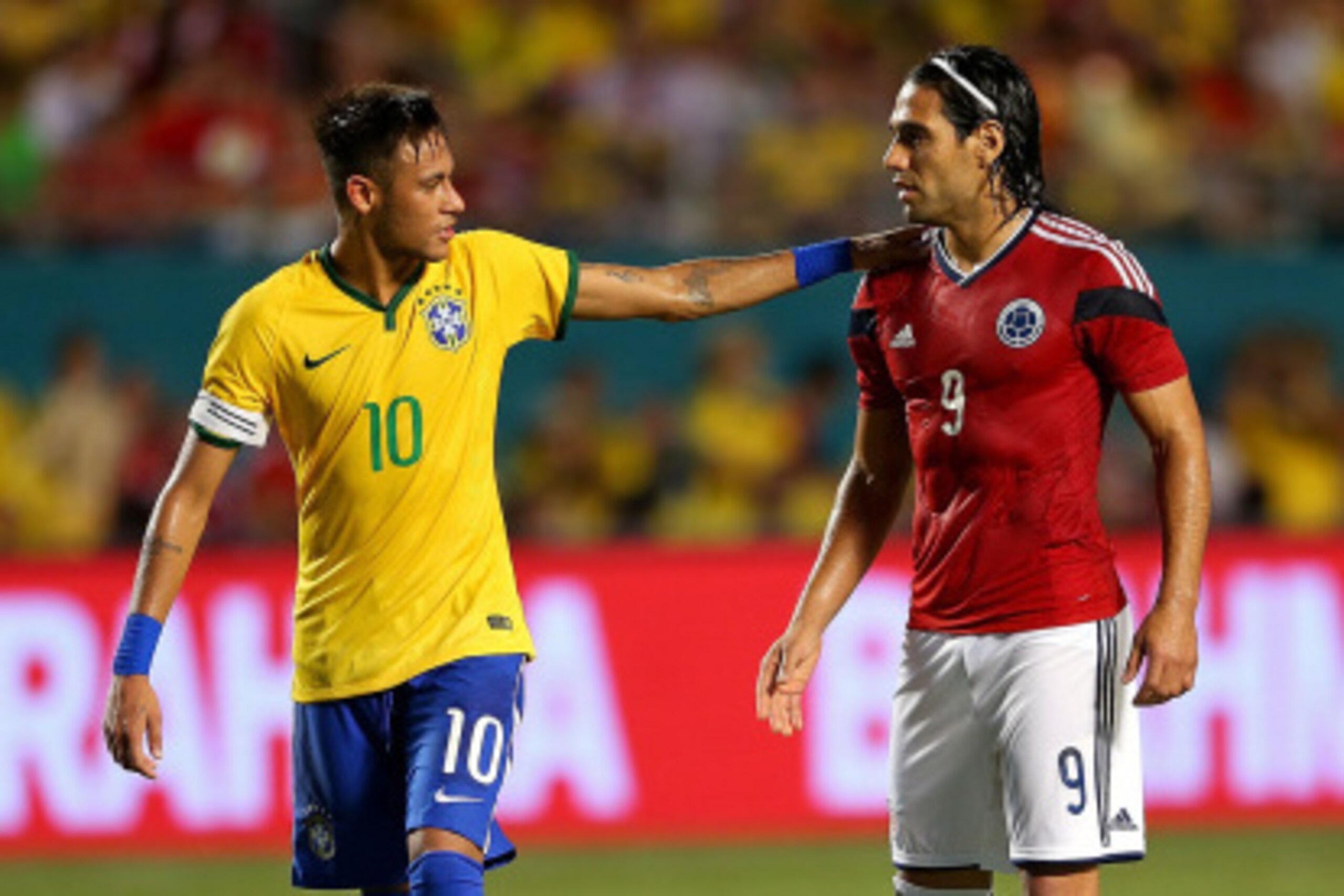 MIAMI GARDENS, FL - SEPTEMBER 05:  Falcao #9 of Colombia greets Neymar #10 of Brazil during an International Soccer friendly against Brazil at Sun Life Stadium on September 5, 2014 in Miami Gardens, Florida.  (Photo by Mike Ehrmann/Getty Images)