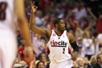May 12, 2014; Portland, OR, USA; Portland Trail Blazers guard Wesley Matthews (2) raises three fingers after scoring a three-point field goal against San Antonio Spurs in the first half in game four of the second round of the 2014 NBA Playoffs at the Moda