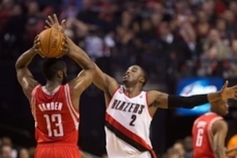 May 2, 2014; Portland, OR, USA; Portland Trail Blazers guard Wesley Matthews (2) defends Houston Rockets guard James Harden (13) in the first half in game six of the first round of the 2014 NBA Playoffs at the Moda Center.Mandatory Credit: Jaime Valdez-US