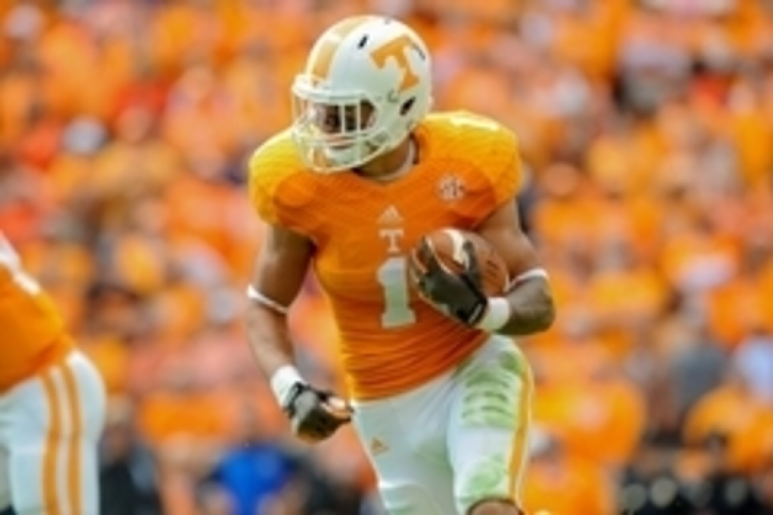 Oct 4, 2014; Knoxville, TN, USA; Tennessee Volunteers running back Jalen Hurd (1) runs the ball against the Florida Gators during the second quarter at Neyland Stadium. Mandatory Credit: Randy Sartin-USA TODAY Sports