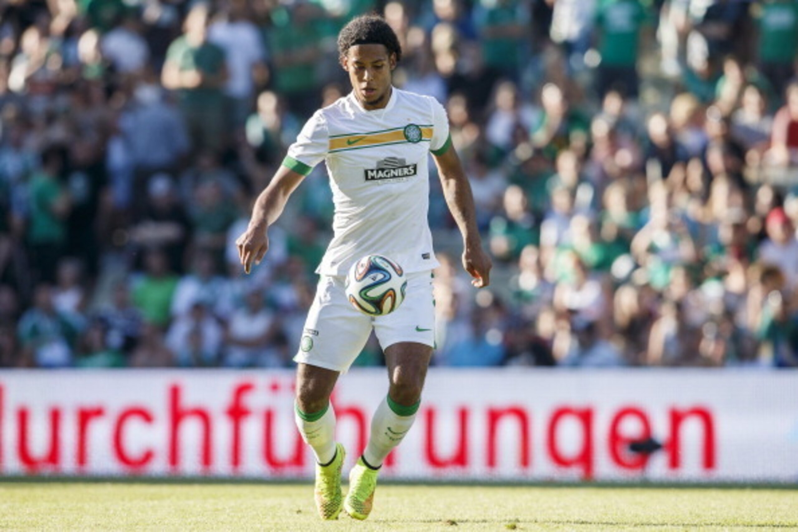VIENNA, AUSTRIA - July 06: Virgil Van Dijk of Celtic Glasgow controls the ball during the Pre Season Friendly between SK Rapid Wien and Celtic Glasgow at Gerhard-Hanappi-Stadium on July 6, 2014 in Vienna, Austria.  (Photo by Christian Hofer/Getty Images)
