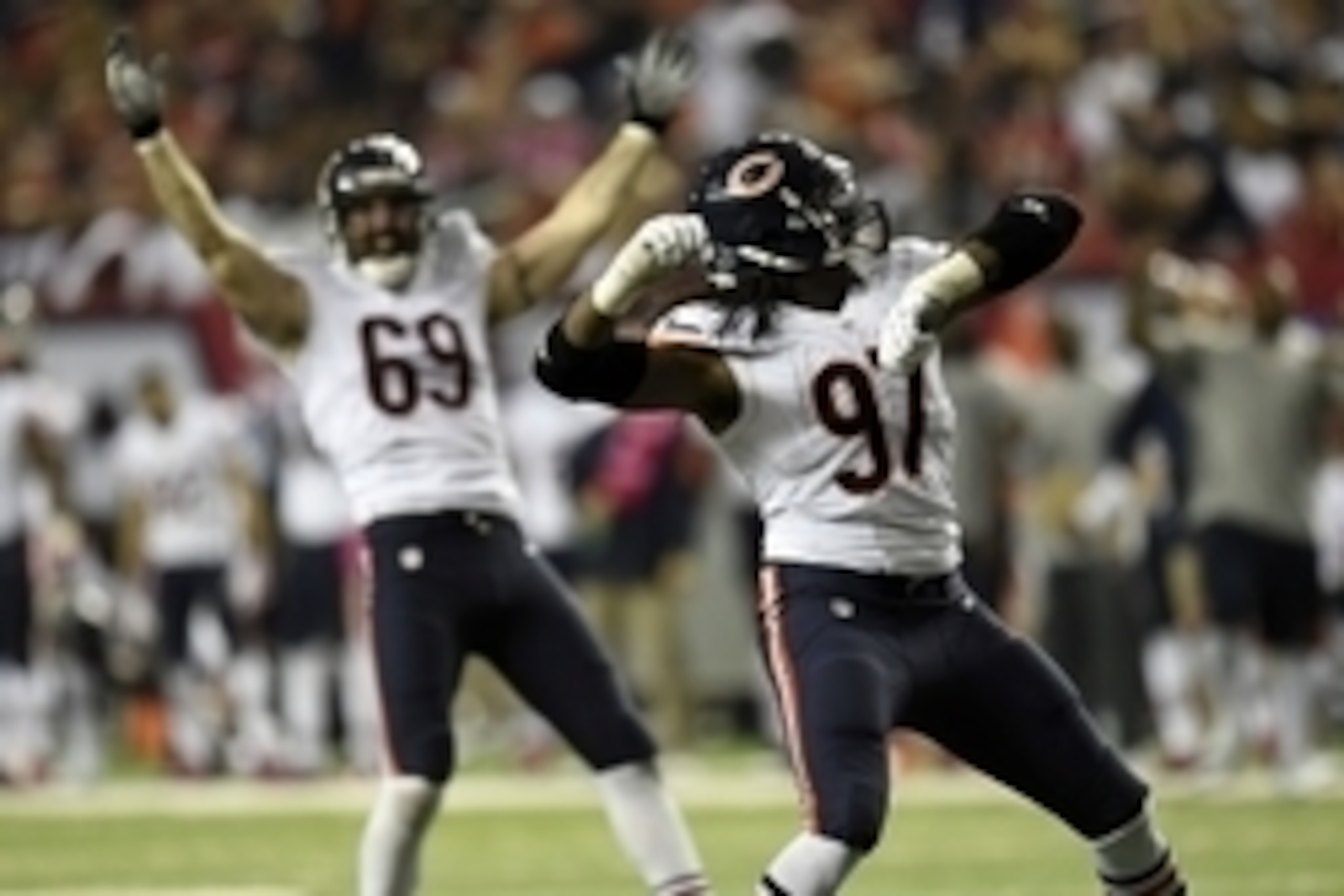 Oct 12, 2014; Atlanta, GA, USA; Chicago Bears defensive end Willie Young (97) and defensive end Jared Allen (69) react to a sack against the Atlanta Falcons during the second half at the Georgia Dome. The Bears defeated the Falcons 27-13. Mandatory Credit Oct 12, 2014; Atlanta, GA, USA; Chicago Bears defensive end Willie Young (97) and defensive end Jared Allen (69) react to a sack against the Atlanta Falcons during the second half at the Georgia Dome. The Bears defeated the Falcons 27-13. Mandatory Credit