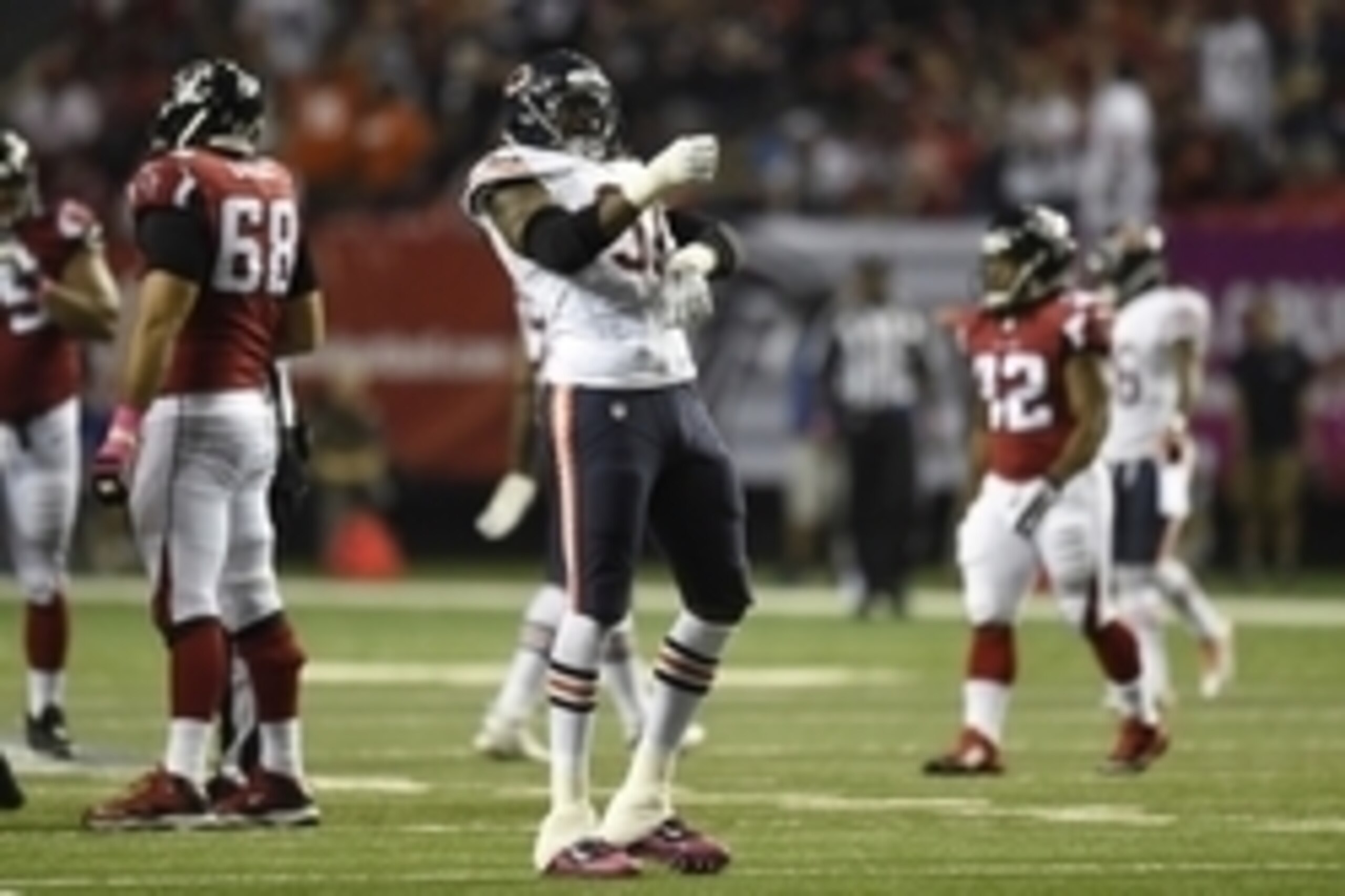 Oct 12, 2014; Atlanta, GA, USA; Chicago Bears defensive end Willie Young (97) reacts after sacking the quarterback against the Atlanta Falcons during the second half at the Georgia Dome. The Bears defeated the Falcons 27-13. Mandatory Credit: Dale Zanine-