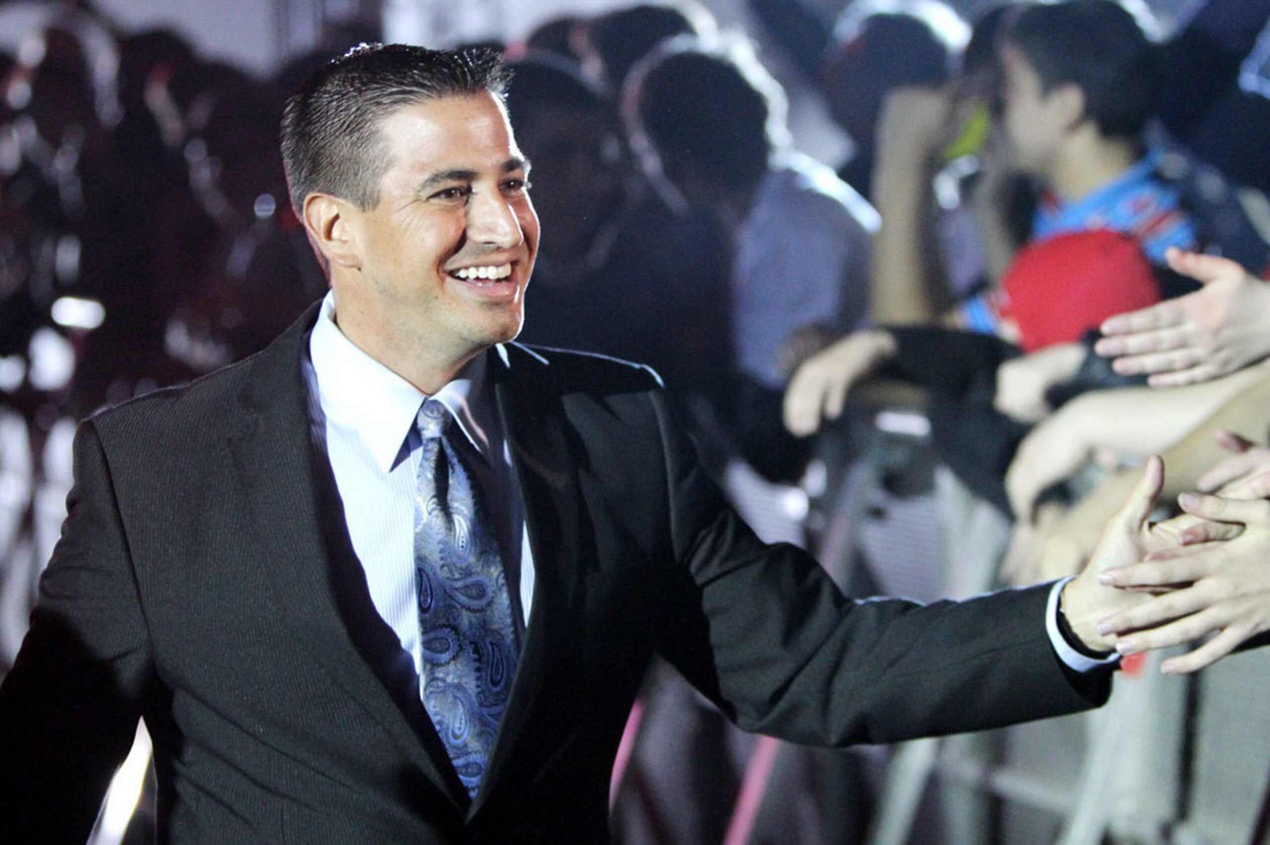 Justin Roberts greets fans.