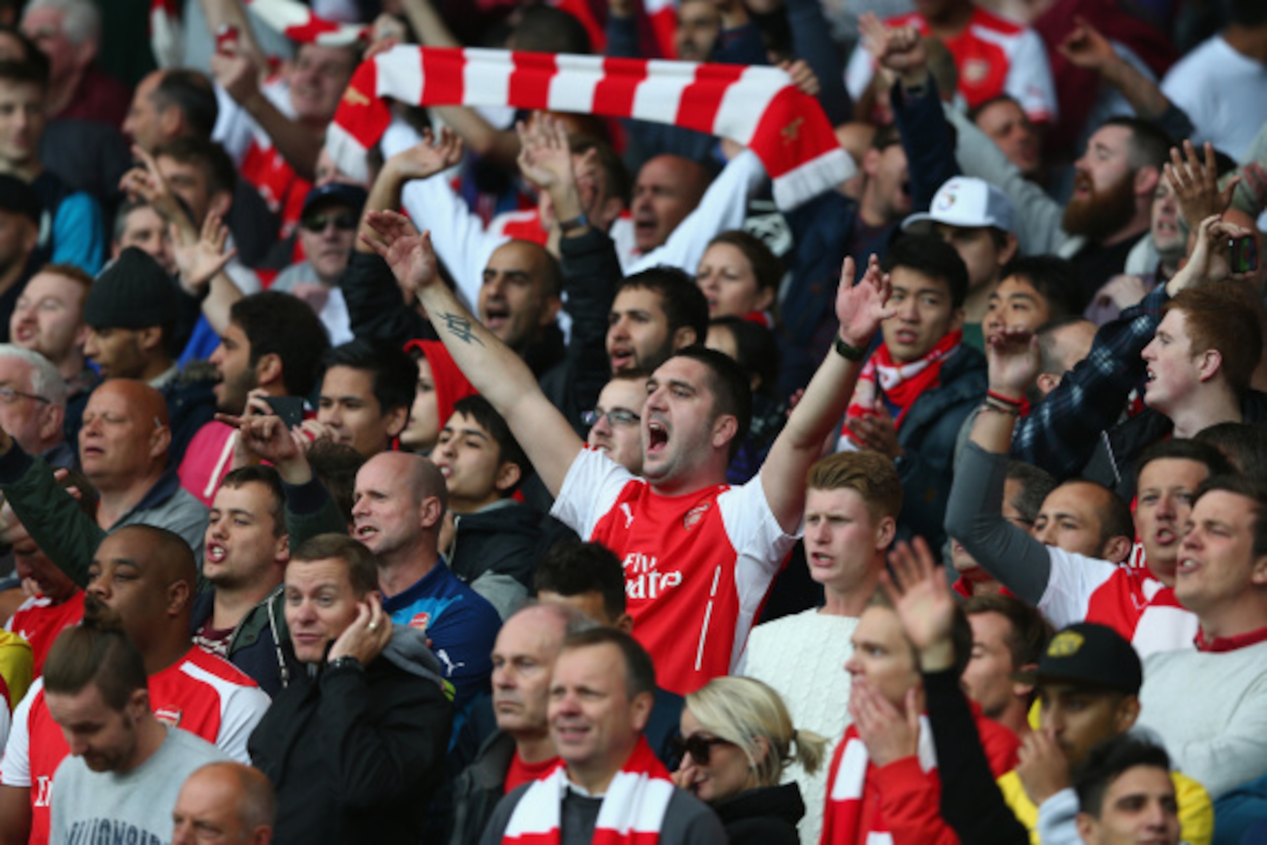 LIVERPOOL, ENGLAND - AUGUST 23:  Arsenal fans during the Barclays Premier League match between Everton and Arsenal at Goodison Park on August 23, 2014 in Liverpool, England.  (Photo by Clive Brunskill/Getty Images)