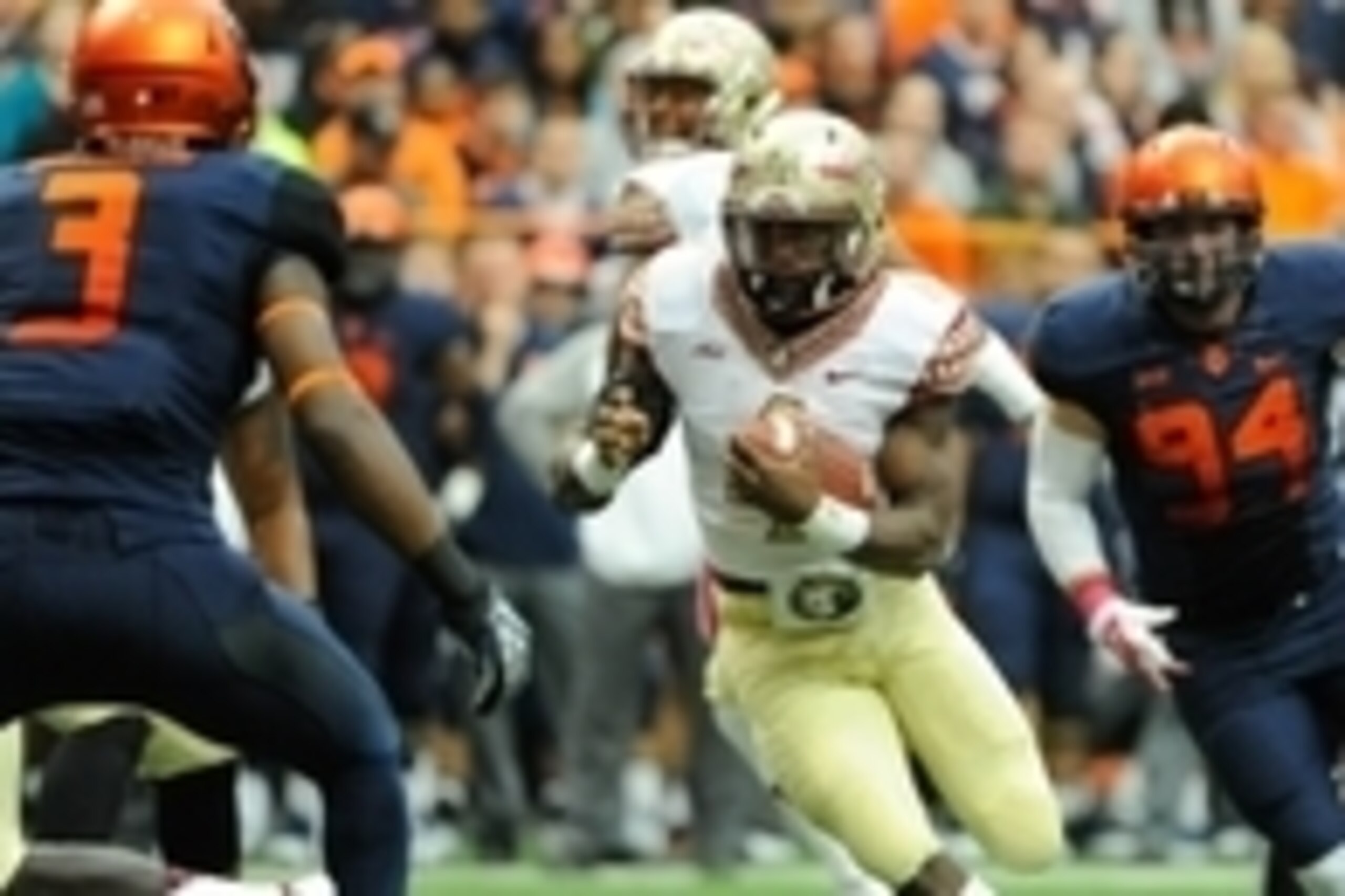 Oct 11, 2014; Syracuse, NY, USA; Florida State Seminoles running back Dalvin Cook (4) runs with the ball in front of Syracuse Orange defensive end Robert Welsh (94) during the first quarter at the Carrier Dome.  Mandatory Credit: Rich Barnes-USA TODAY Spo