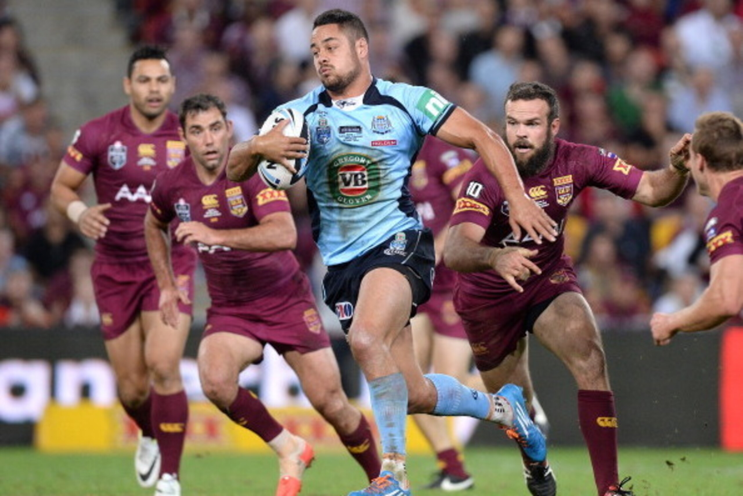 BRISBANE, AUSTRALIA - MAY 28:  Jarryd Hayne of the Blues breaks through the defence during game one of the State of Origin series between the Queensland Maroons and the New South Wales Blues at Suncorp Stadium on May 28, 2014 in Brisbane, Australia.  (Pho
