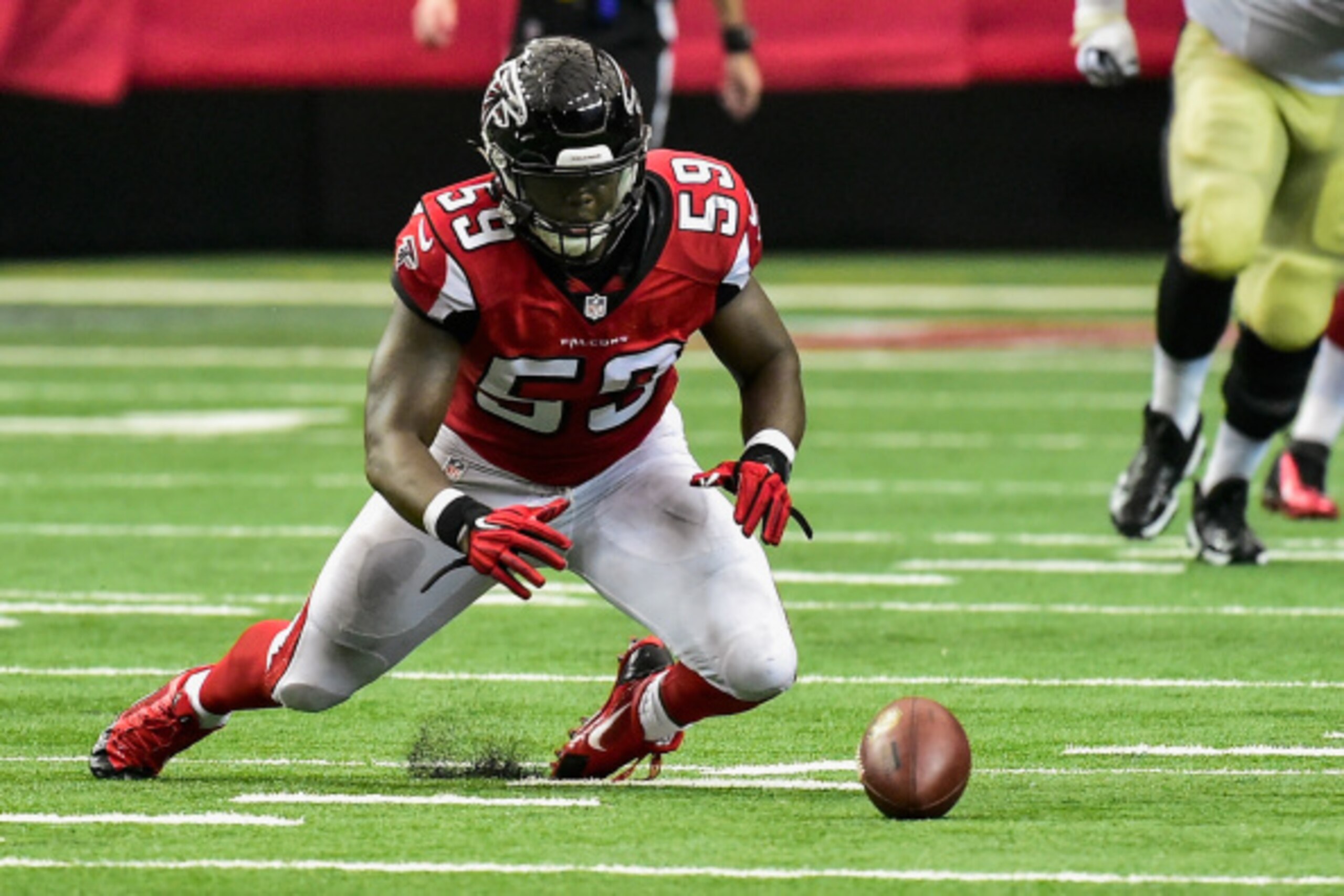 ATLANTA, GA - SEPTEMBER 07:  Joplo Bartu #59 of the Atlanta Falcons recovers a fumble in overtime against the New Orleans Saints at the Georgia Dome on September 7, 2014 in Atlanta, Georgia. The Falcons won 37-34.  (Photo by Scott Cunningham/Getty Images)