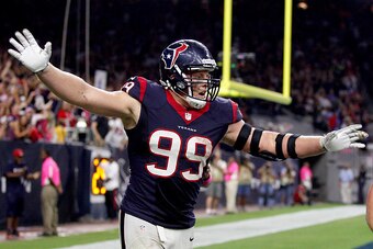 HOUSTON, TX- OCTOBER 09: J.J. Watt #99 of the Houston Texans celebrates an Indianapolis Colts fumble after he returned it for a touchdown in the fourth quarter in a NFL game on October 9, 2014 at NRG Stadium in Houston, Texas. (Photo by Bob Levey/Getty Im