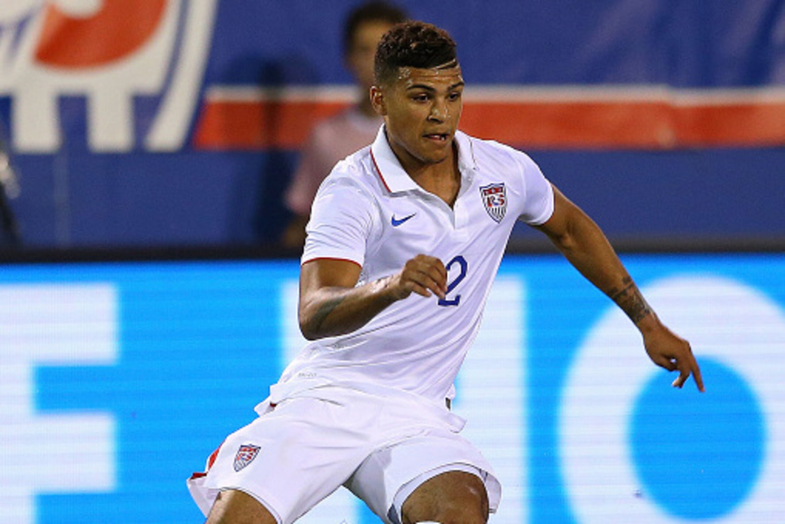 BOCA RATON, FL - OCTOBER 14:  DeAndre Yedlin #2 of the USA brings the ball upfield during a game against Honduras at FAU Stadium on October 14, 2014 in Boca Raton, Florida.  (Photo by Mike Ehrmann/Getty Images)
