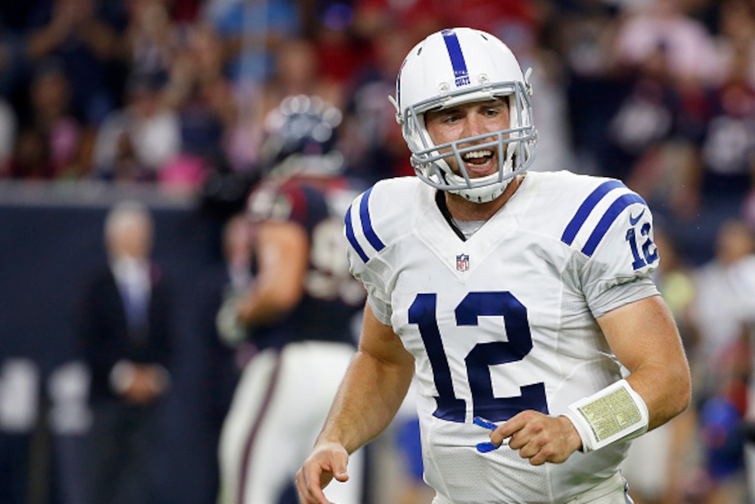 HOUSTON, TX- OCTOBER 09: Andrew Luck #12 of the Indianapolis Colts celebrates against the Houston Texans in the fourth quarter in a NFL game on October 9, 2014 at NRG Stadium in Houston, Texas. (Photo by Scott Halleran/Getty Images)