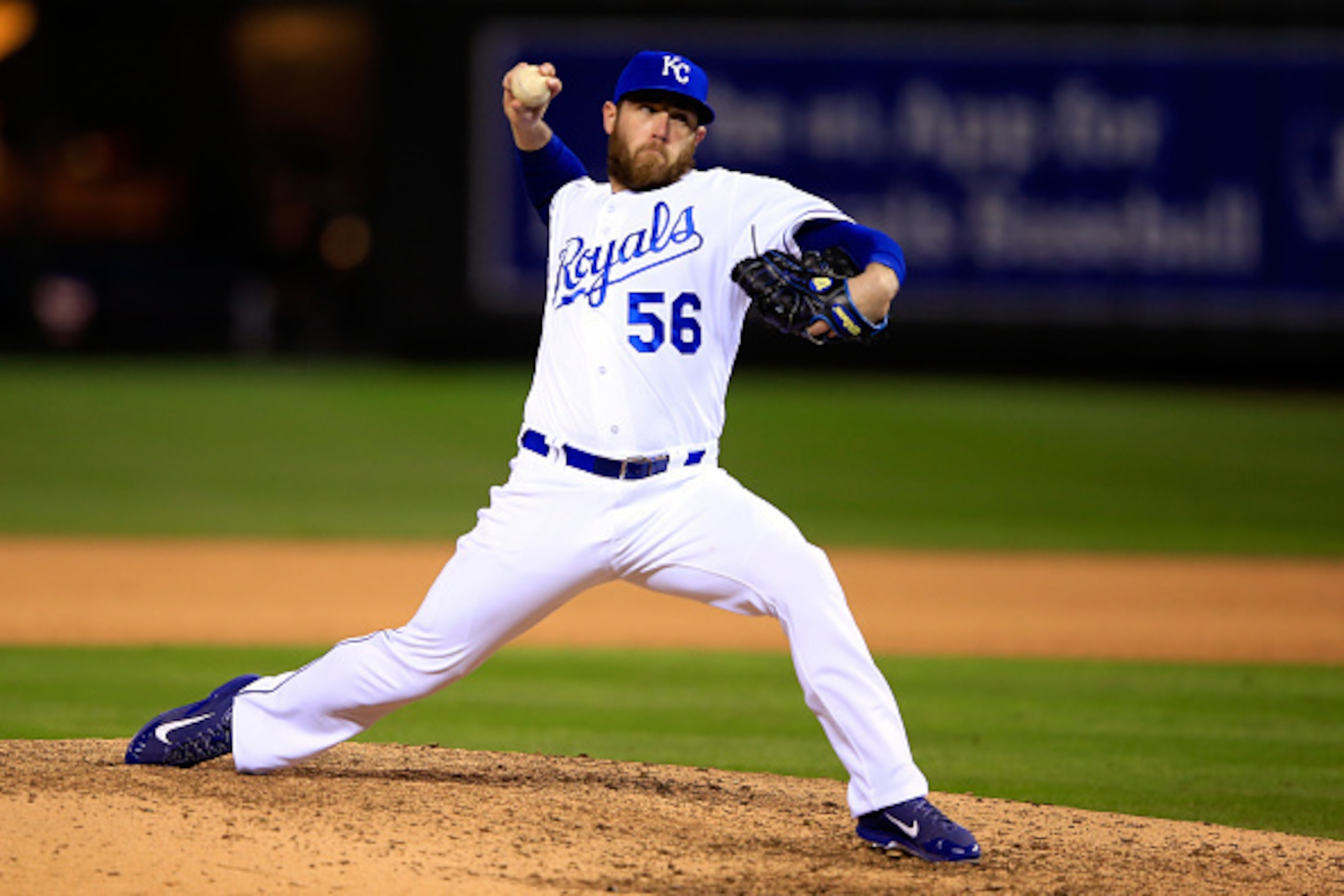 KANSAS CITY, MO - OCTOBER 14: Greg Holland #56 of the Kansas City Royals throws a pitch in the ninth inning against the Baltimore Orioles during Game Three of the American League Championship Series at Kauffman Stadium on October 14, 2014 in Kansas City, KANSAS CITY, MO - OCTOBER 14: Greg Holland #56 of the Kansas City Royals throws a pitch in the ninth inning against the Baltimore Orioles during Game Three of the American League Championship Series at Kauffman Stadium on October 14, 2014 in Kansas City,