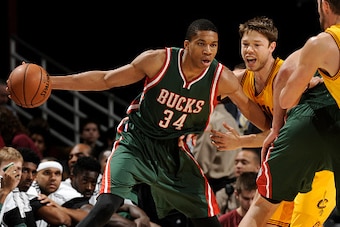 CLEVELAND, OH - OCTOBER 14:  Giannis Antetokounmpo #34 of the Milwaukee Bucks handles the ball against the Cleveland Cavaliers at The Quicken Loans Arena on October 14, 2014 in Cleveland, Ohio. NOTE TO USER: User expressly acknowledges and agrees that, by