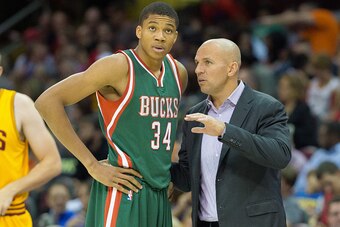 CLEVELAND, OH - OCTOBER 14: Giannis Antetokounmpo #34 talks with head coach Jason Kidd of the Milwaukee Bucks during the first half at Quicken Loans Arena on October 14, 2014 in Cleveland, Ohio. User expressly acknowledges and agrees that, by downloading 