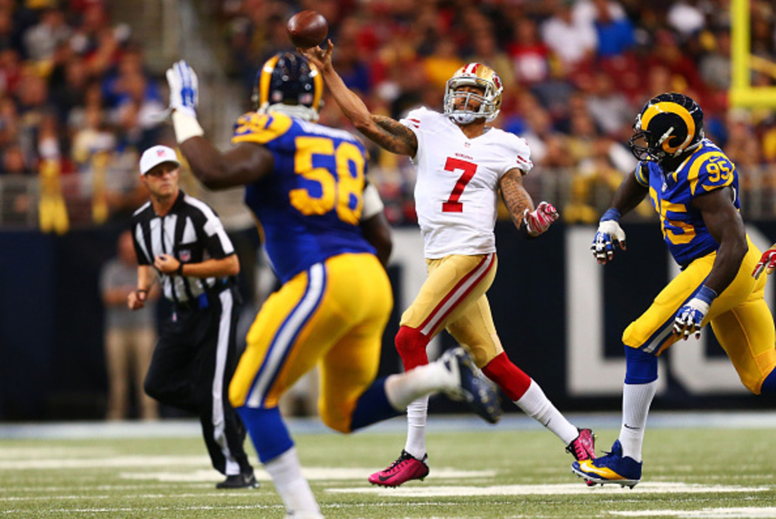 ST LOUIS, MO - OCTOBER 13:   Colin Kaepernick #7 of the San Francisco 49ers passes against the St. Louis Rams in the second quarter at Edward Jones Dome on October 13, 2014 in St Louis, Missouri.  (Photo by Dilip Vishwanat/Getty Images)