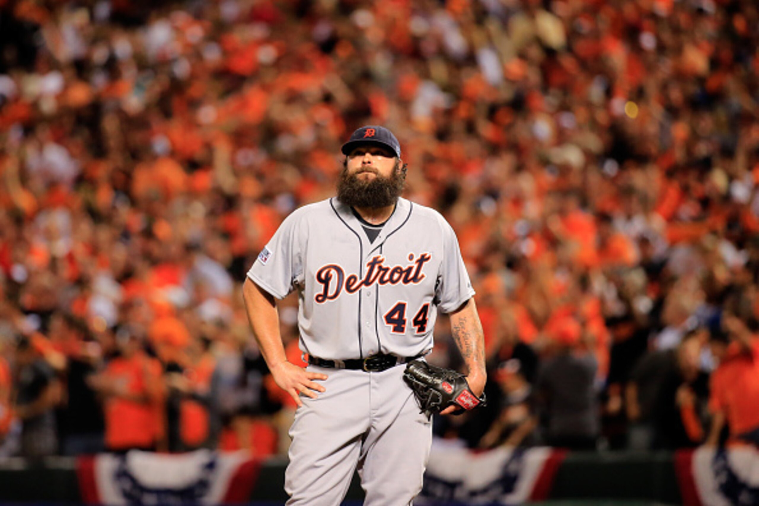 BALTIMORE, MD - OCTOBER 02:  Joba Chamberlain #44 of the Detroit Tigers reacts after giving up two runs in the eighth inning against the Baltimore Orioles during Game One of the American League Division Series at Oriole Park at Camden Yards on October 2, 