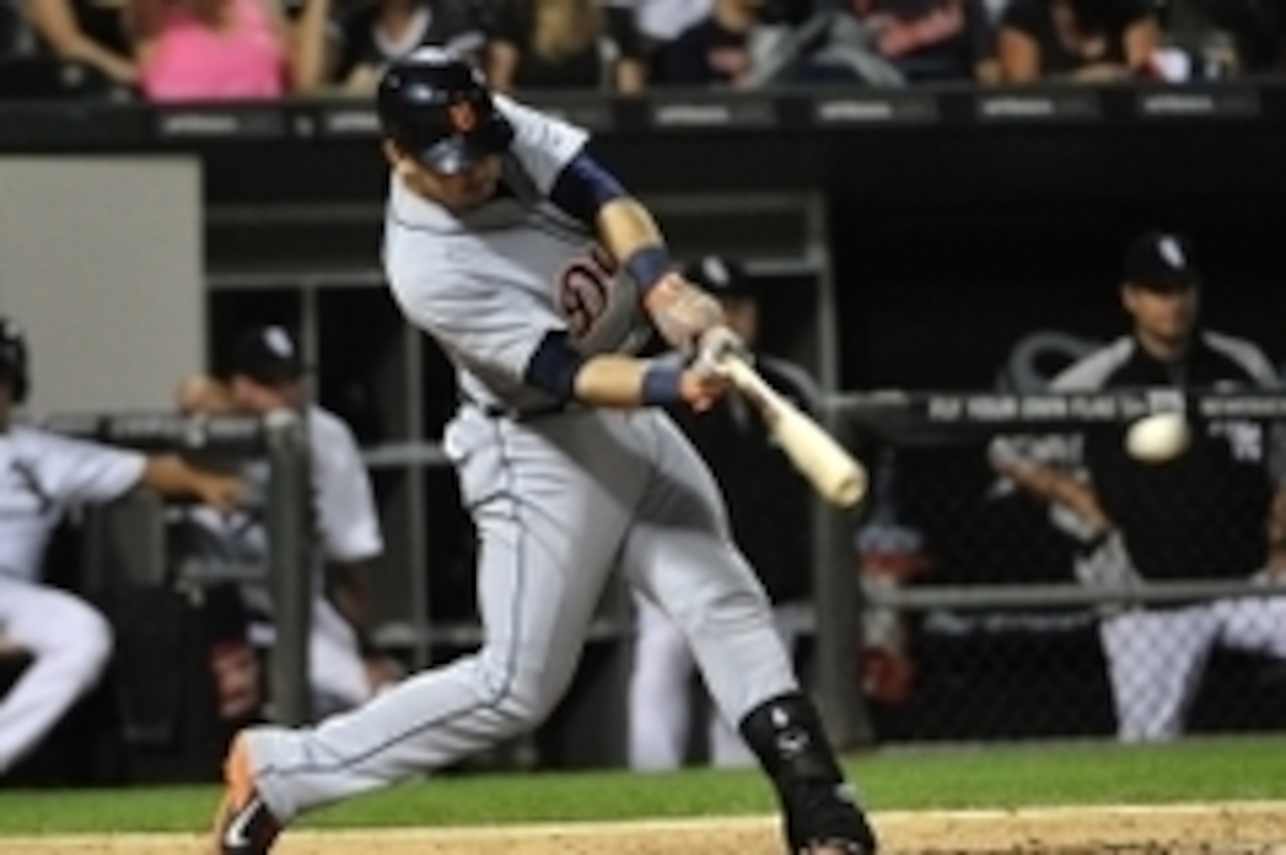 Aug 29, 2014; Chicago, IL, USA;  Detroit Tigers shortstop Eugenio Suarez (30) hits a single against the Chicago White Sox during the fourth inning at U.S Cellular Field. Mandatory Credit: David Banks-USA TODAY Sports