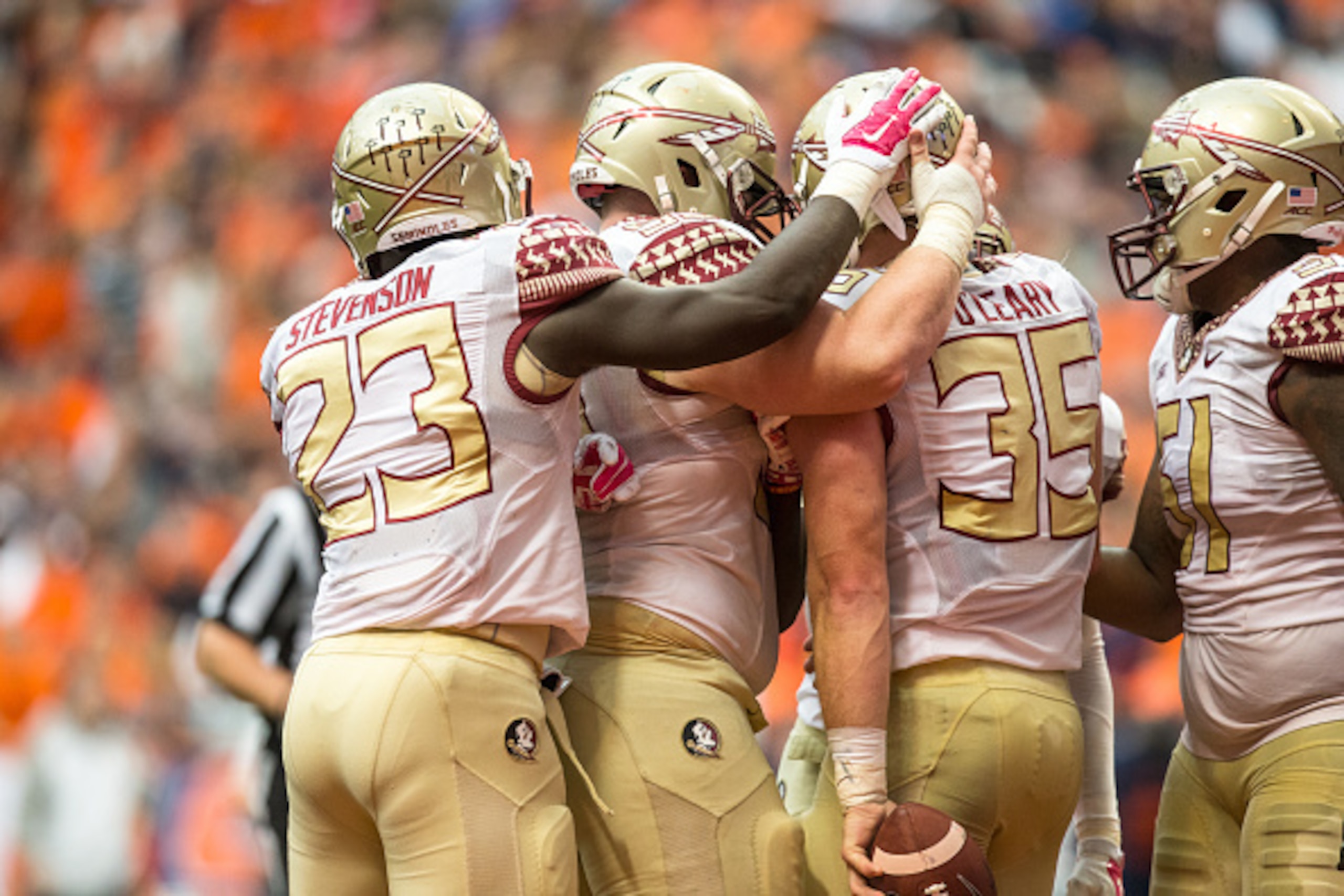 SYRACUSE, NY - OCTOBER 11:  Nick O'Leary #35 of the Florida State Seminoles is congratulated after a touchdown reception on October 11, 2014 at The Carrier Dome in Syracuse, New York.  Florida State Seminoles defeat Syracuse Orange 38-20.  (Photo by Brett
