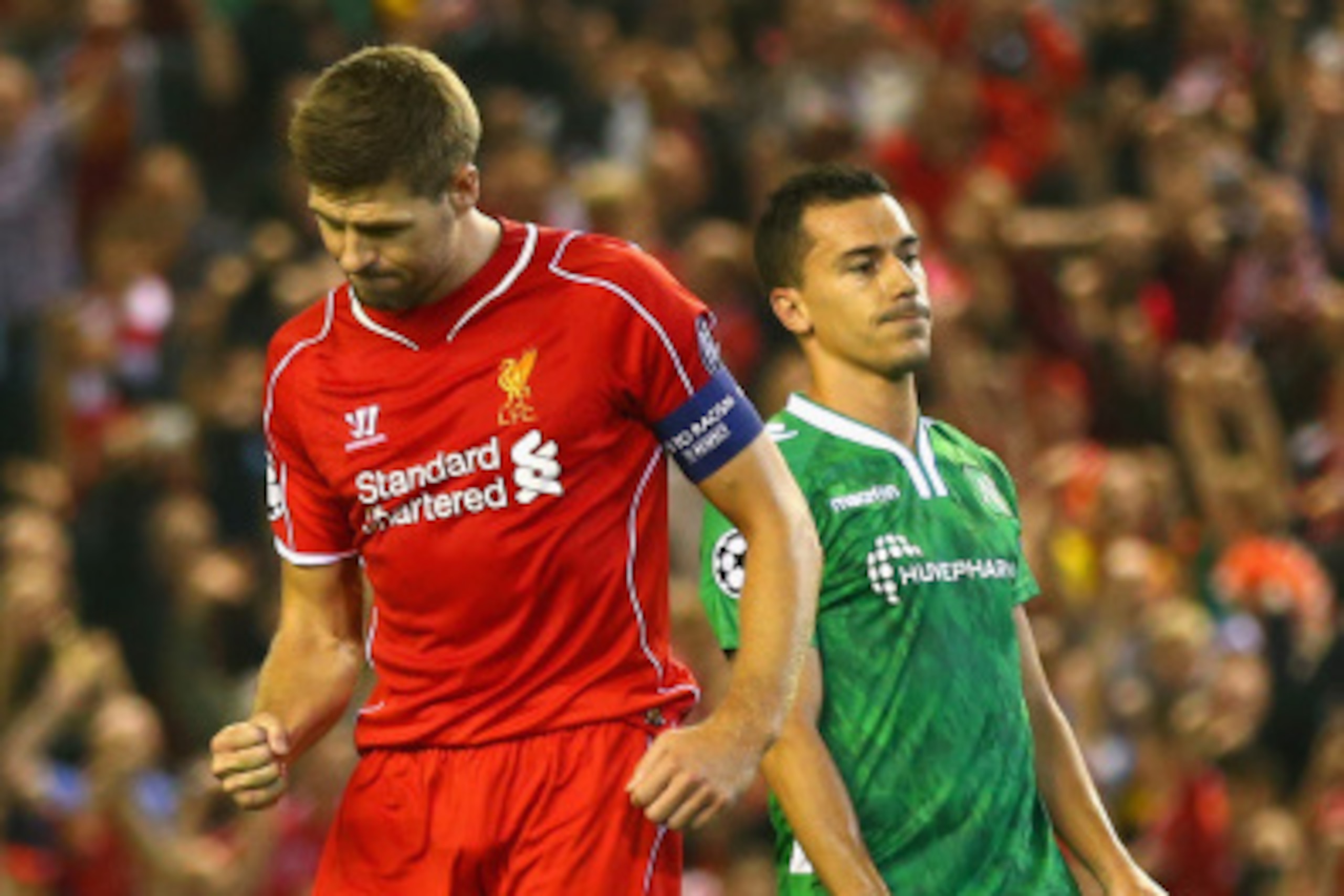 LIVERPOOL, ENGLAND - SEPTEMBER 16:  Steven Gerrard of Liverpool celebrates scoring the second goal from the penalty spot during the UEFA Champions League Group B match between Liverpool FC and PFC Ludogorets Razgrad at Anfield on September 16, 2014 in Liv