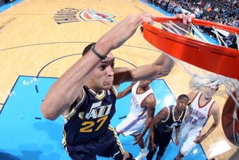 OKLAHOMA CITY, OK - NOVEMBER 24:  Rudy Gobert #27 of the Utah Jazz dunks the ball against the Oklahoma City Thunder on November 24, 2013 at the Chesapeake Energy Arena in Oklahoma City, Oklahoma. NOTE TO USER: User expressly acknowledges and agrees that, 