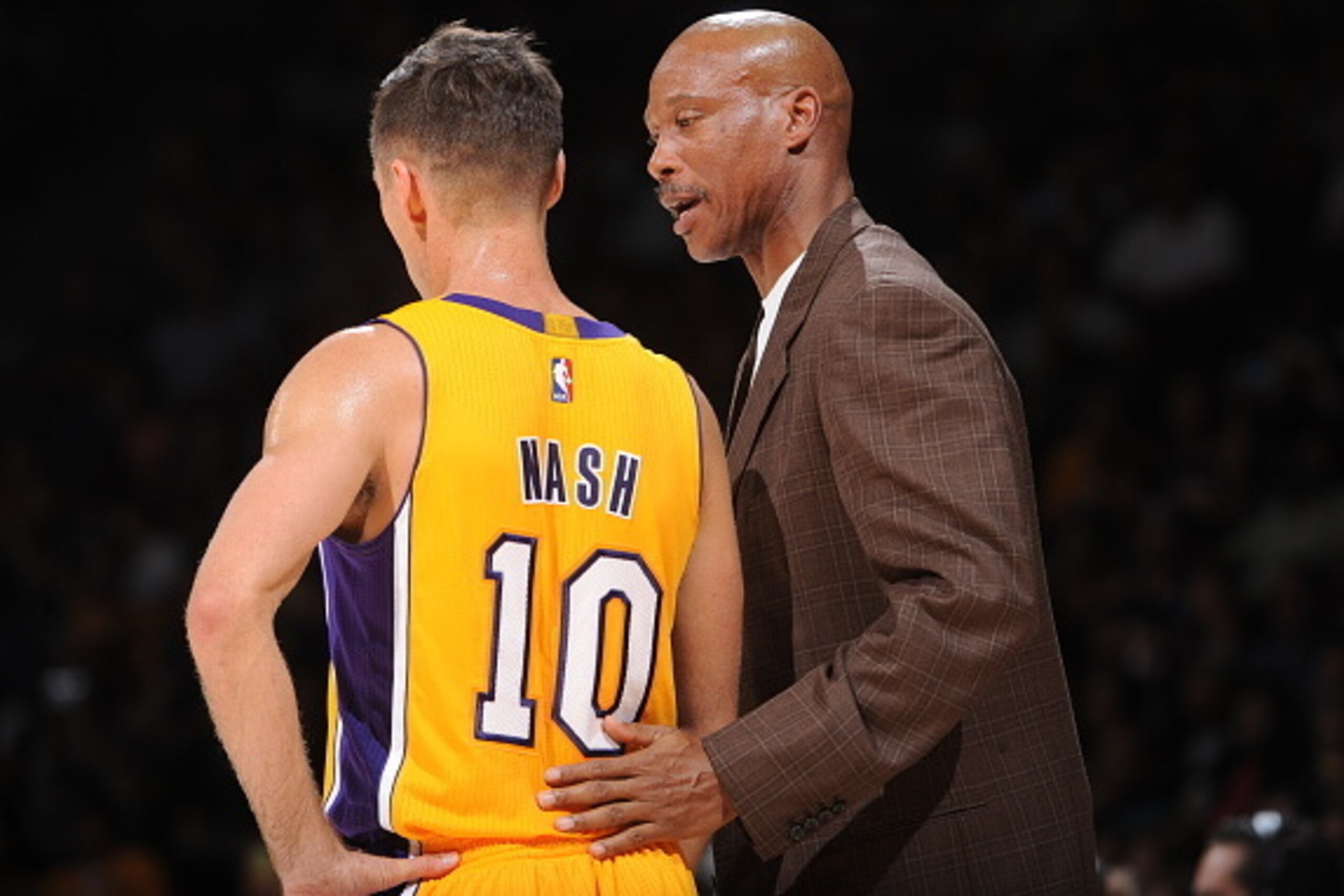 SAN DIEGO, CA- OCTOBER 6: Byron Scott, Head Coach, and Steve Nash #10 of the Los Angeles Lakers speak during a game  against the Denver Nuggets as the Los Angeles Lakers take on the Denver Nuggets at the Valley View Sports Arena in San Diego, California o