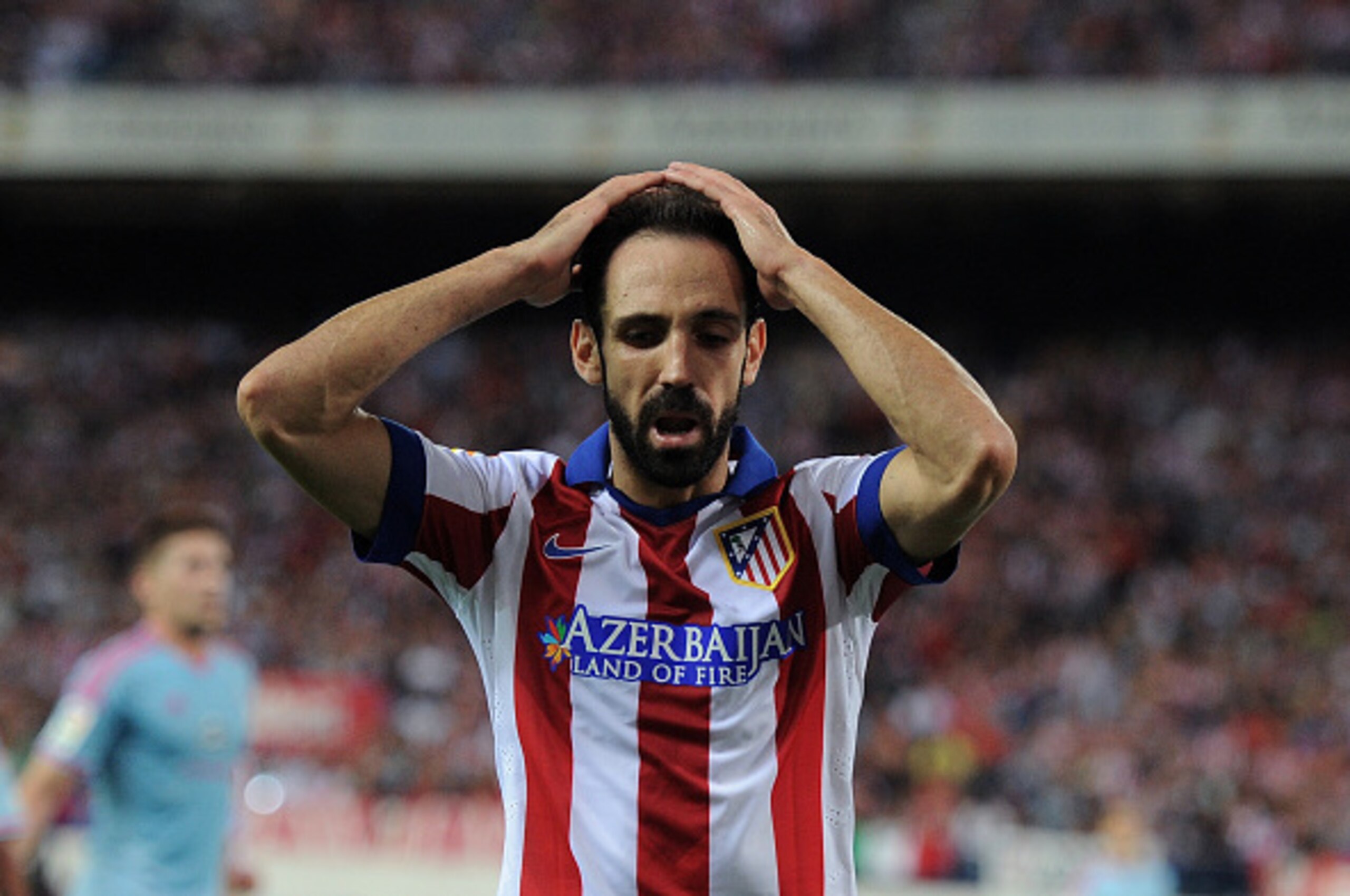 MADRID, SPAIN - SEPTEMBER 20:  Juanfran of Club Atletico de Madrid reacts after failing to score during the La Liga match at the Vicente Calderon stadium on September 20, 2014 in Madrid, Spain.  (Photo by Denis Doyle/Getty Images)