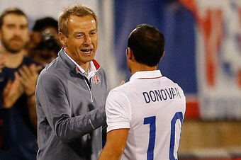EAST HARTFORD, CT- OCTOBER 10: Landon Donovan #10 of the United States shakes hands head coach Jurgen Klinsmann as he leaves the field after playing in the first half during an international friendly with Ecuador at Rentschler Field on October 10, 2014 in