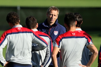 BOSTON, MA - OCTOBER 08:  Head coach Jurgen Klinsmann speaks to his players during a United States soccer training session at Ohiri Field on October 8, 2014 in Boston, Massachusetts.  (Photo by Mike Lawrie/Getty Images)
