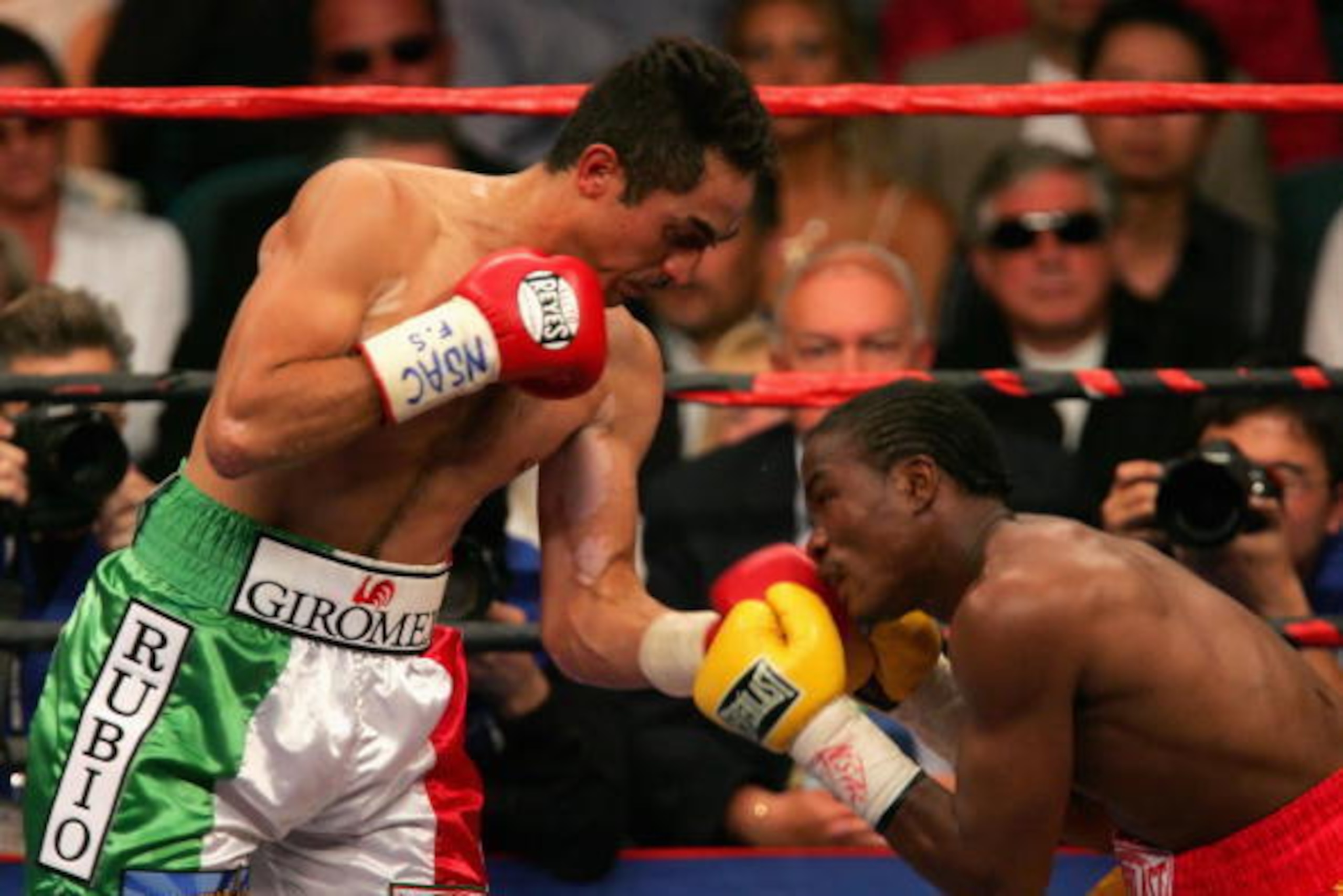 LAS VEGAS - MAY 06:  Marco Antonio Rubio (L) lands a left hook on Kassim Ouma (R) during their WBC middleweight bout on the undercard of the Ricardo Mayorga-Oscar De La Hoya fight at the MGM Grand Garden Arena May 6, 2006 in Las Vegas, Nevada.  Kassim Oum