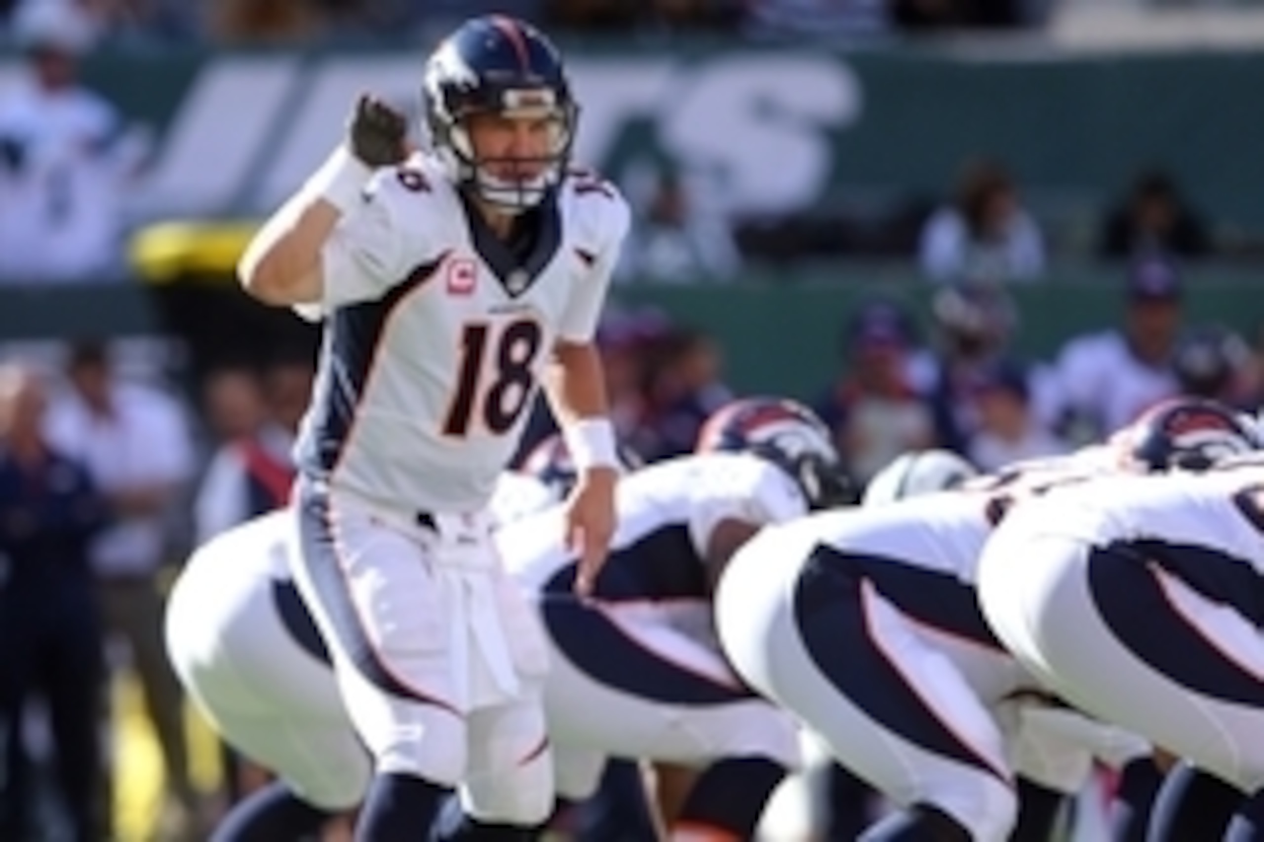 Oct 12, 2014; East Rutherford, NJ, USA; Denver Broncos quarterback Peyton Manning (18) calls a play at the line during the third quarter against the New York Jets at MetLife Stadium. Mandatory Credit: Brad Penner-USA TODAY Sports
