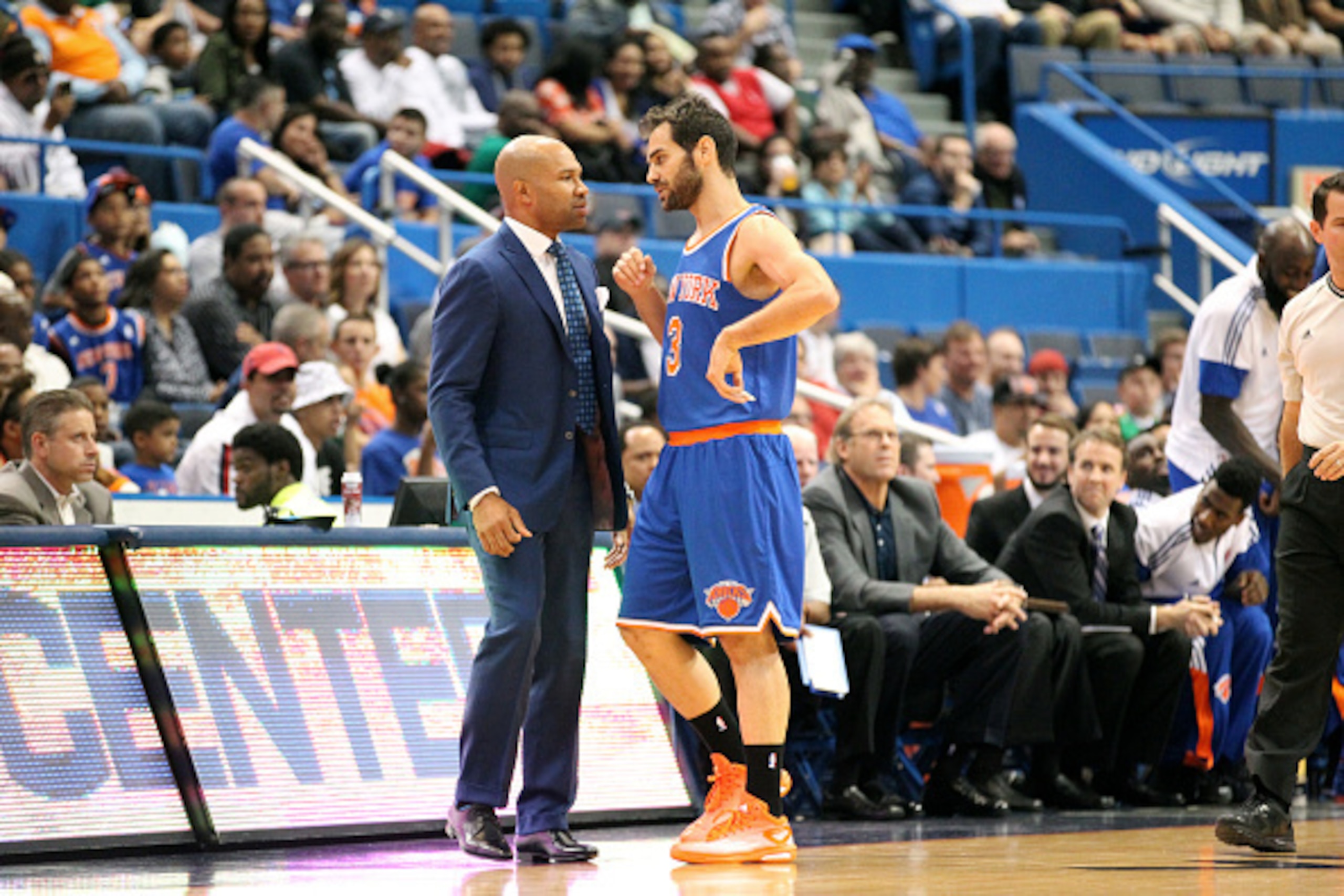 HARTFORD, CT - OCTOBER 8: Head coach Derek Fisher and Jose Calderon #3 of the New York Knicks speak during the game against the Boston Celtics during a preseason game at the XL Center on October 8, 2014 in Hartford, Connecticut. NOTE TO USER: User express