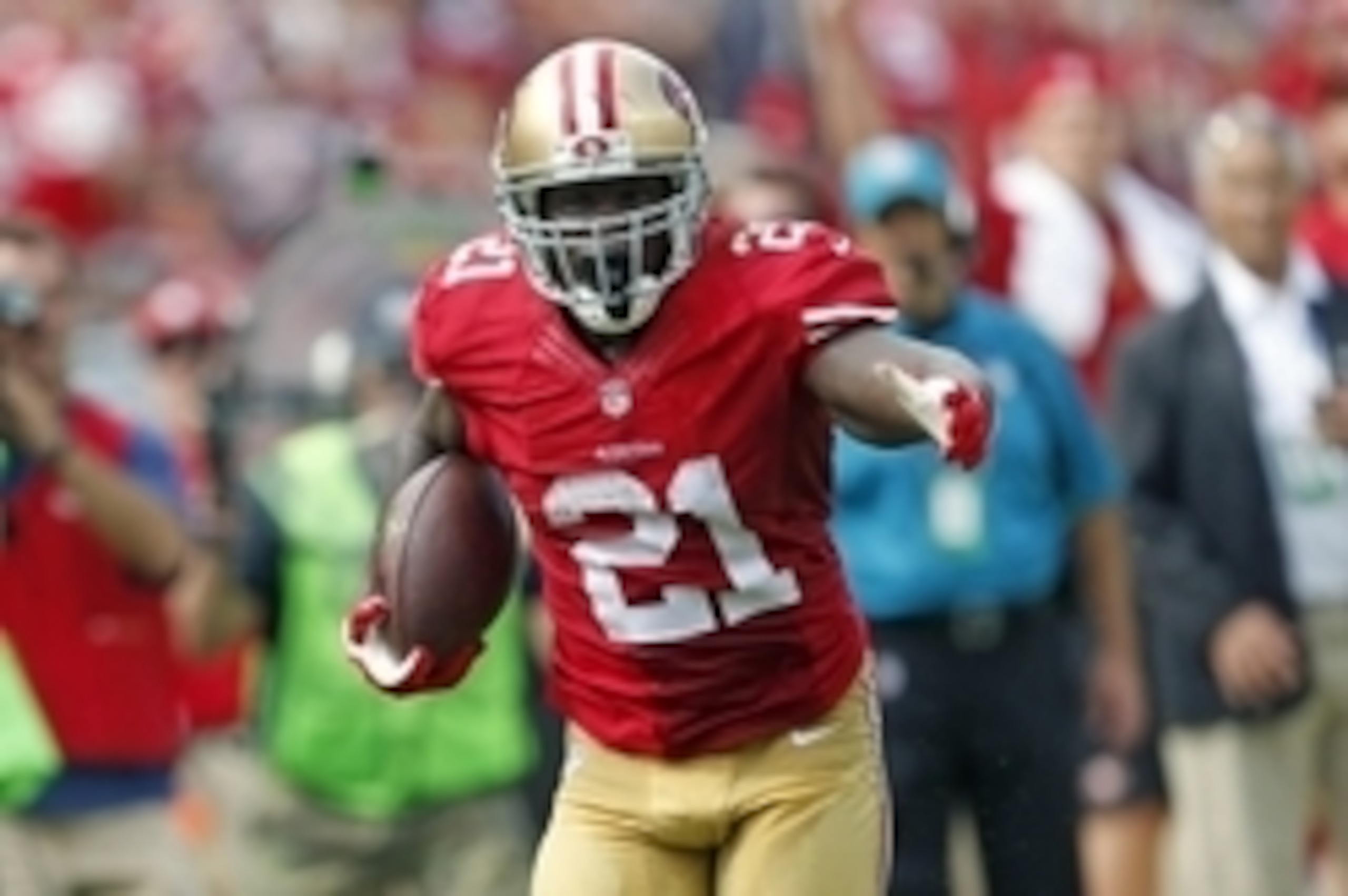 Sep 28, 2014; Santa Clara, CA, USA; San Francisco 49ers running back Frank Gore (21) breaks for 55 yard touchdown on a pass from 49ers quarterback Colin Kaepernick (7), not in picture, against the Philadelphia Eagles during the second quarter at Levi's St