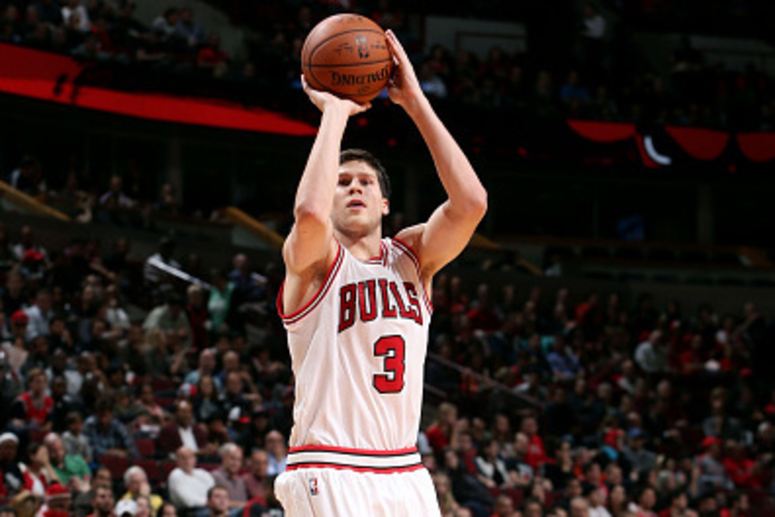CHICAGO, IL - OCTOBER 13: Doug McDermott #3 of the Chicago Bulls shoots against the Denver Nuggets on October 13, 2014 at United Center, Chicago, Illinois. NOTE TO USER: User expressly acknowledges and agrees that, by downloading and or using this Photogr