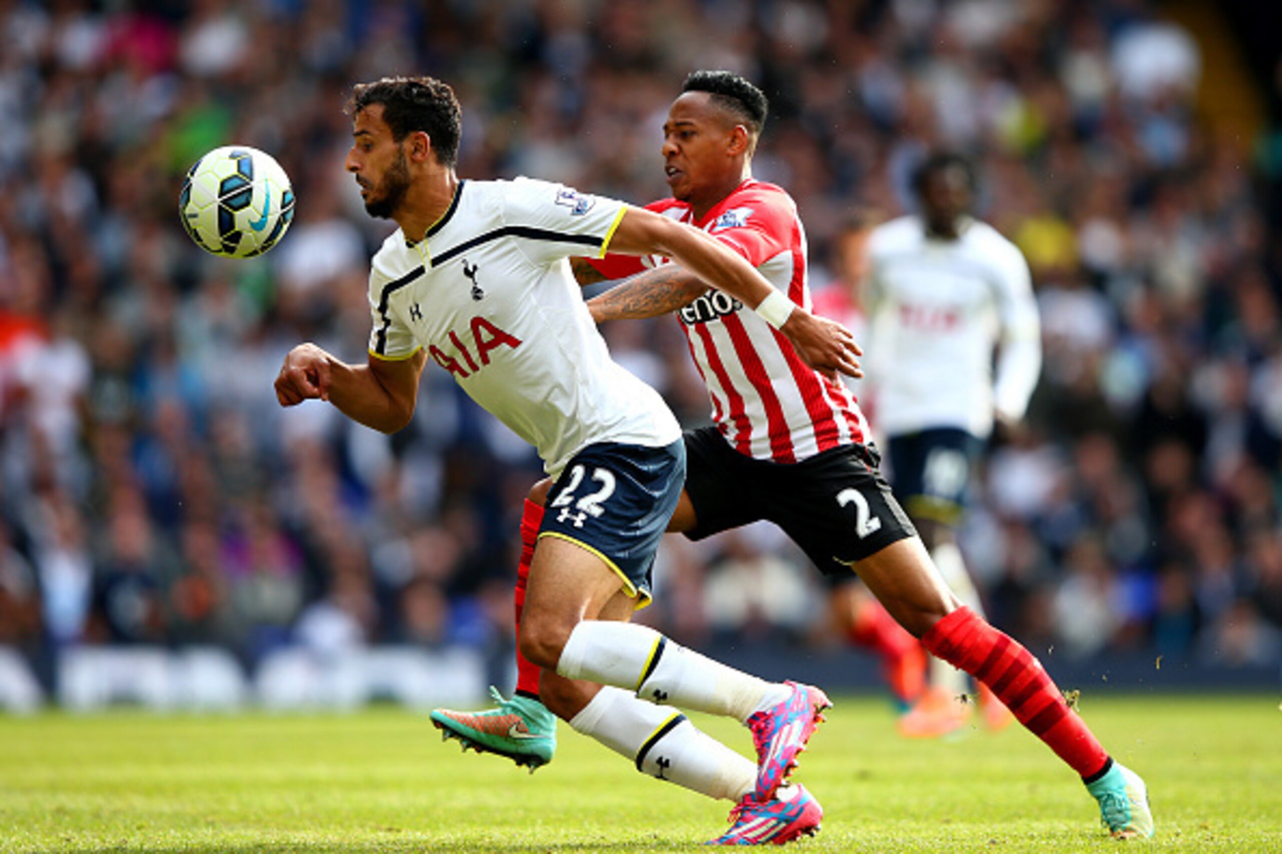 LONDON, ENGLAND - OCTOBER 05:  Nacer Chadli of Spurs battles for the ball with Nathaniel Clyne of Southampton during the Barclays Premier League match between Tottenham Hotspur and Southampton at White Hart Lane on October 5, 2014 in London, England.  (Ph