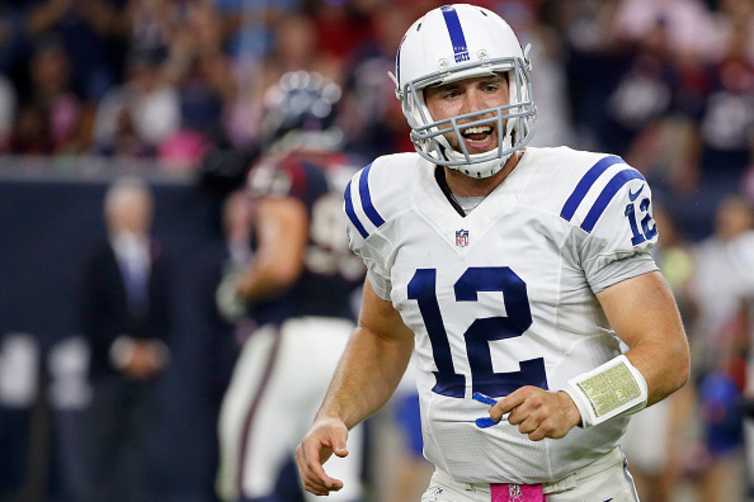 HOUSTON, TX- OCTOBER 09: Andrew Luck #12 of the Indianapolis Colts celebrates against the Houston Texans in the fourth quarter in a NFL game on October 9, 2014 at NRG Stadium in Houston, Texas. (Photo by Scott Halleran/Getty Images)