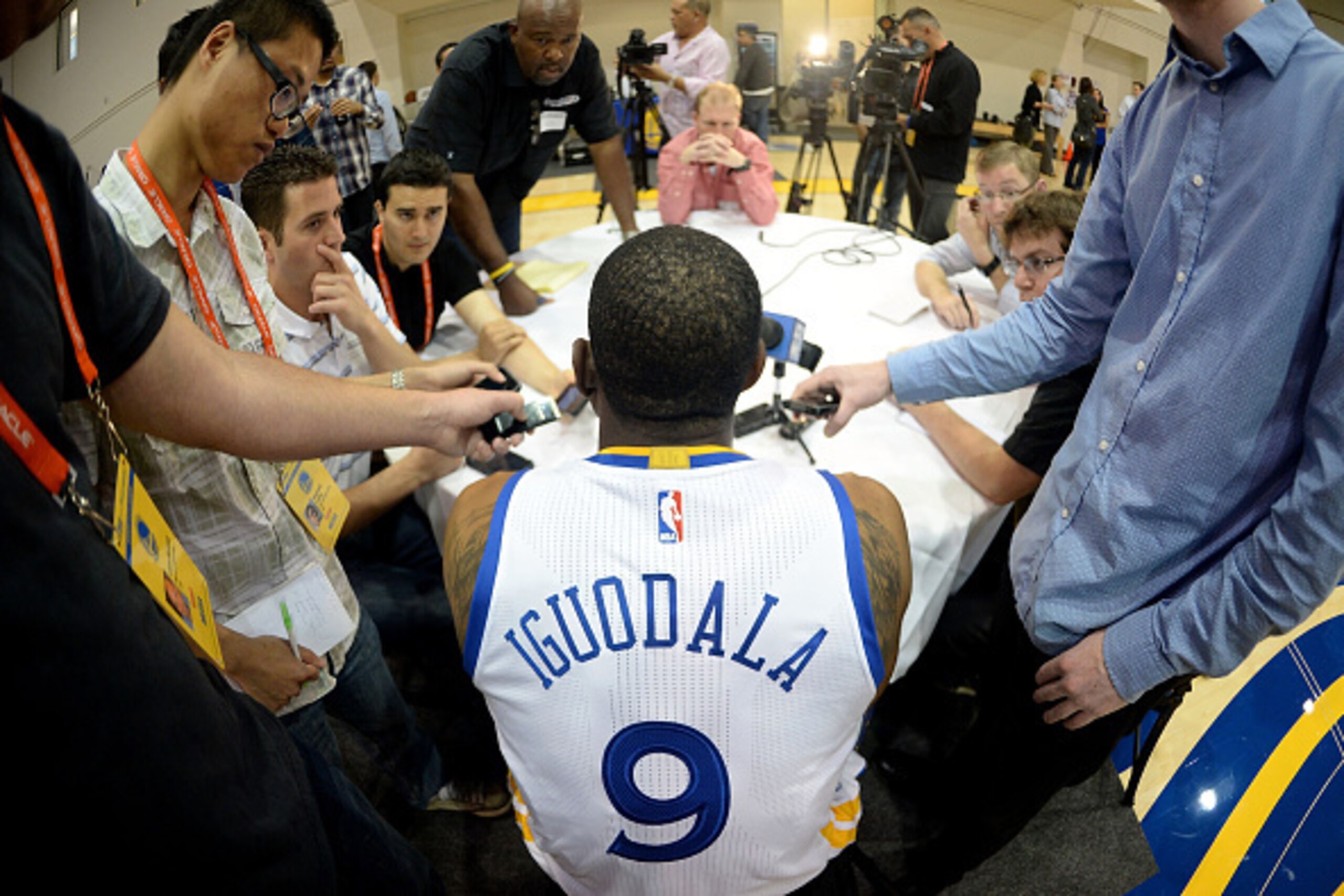 OAKLAND - SEPTEMBER 29:   Andre Iguodala #9 of the Golden State Warriors is Interviewed during media day on September 29, 2014 at the Warriors practice facility in Oakland, California. NOTE TO USER: User expressly acknowledges and agrees that, by download