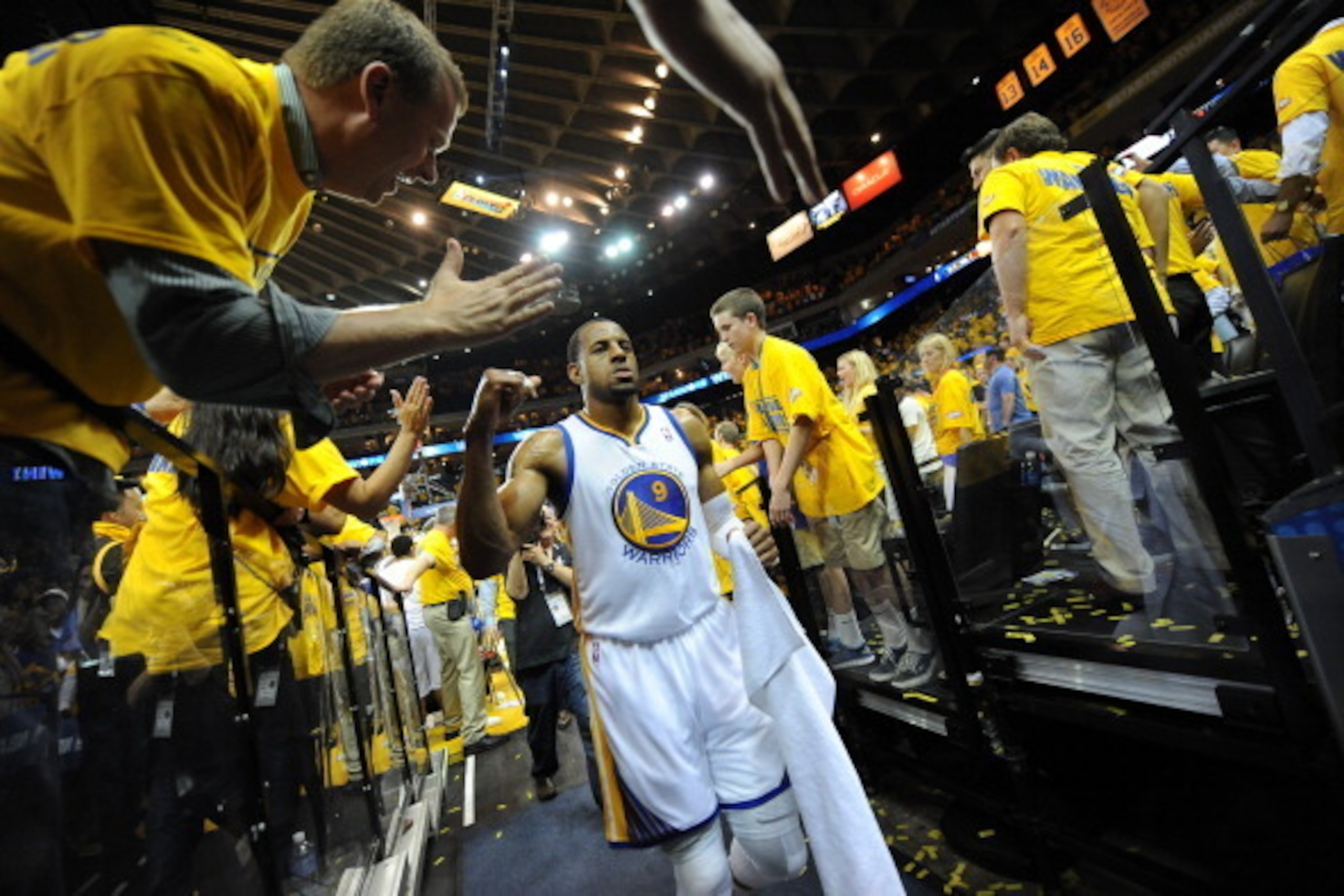 OAKLAND, CA - MAY 1: Andre Iguodala #9 of the Golden State Warriors leaves the arena after winning against the Los Angeles Clippers in Game Six of the Western Conference Quarterfinals during the NBA Playoffs at Oracle Arena on May 1, 2014 in Oakland, Cali