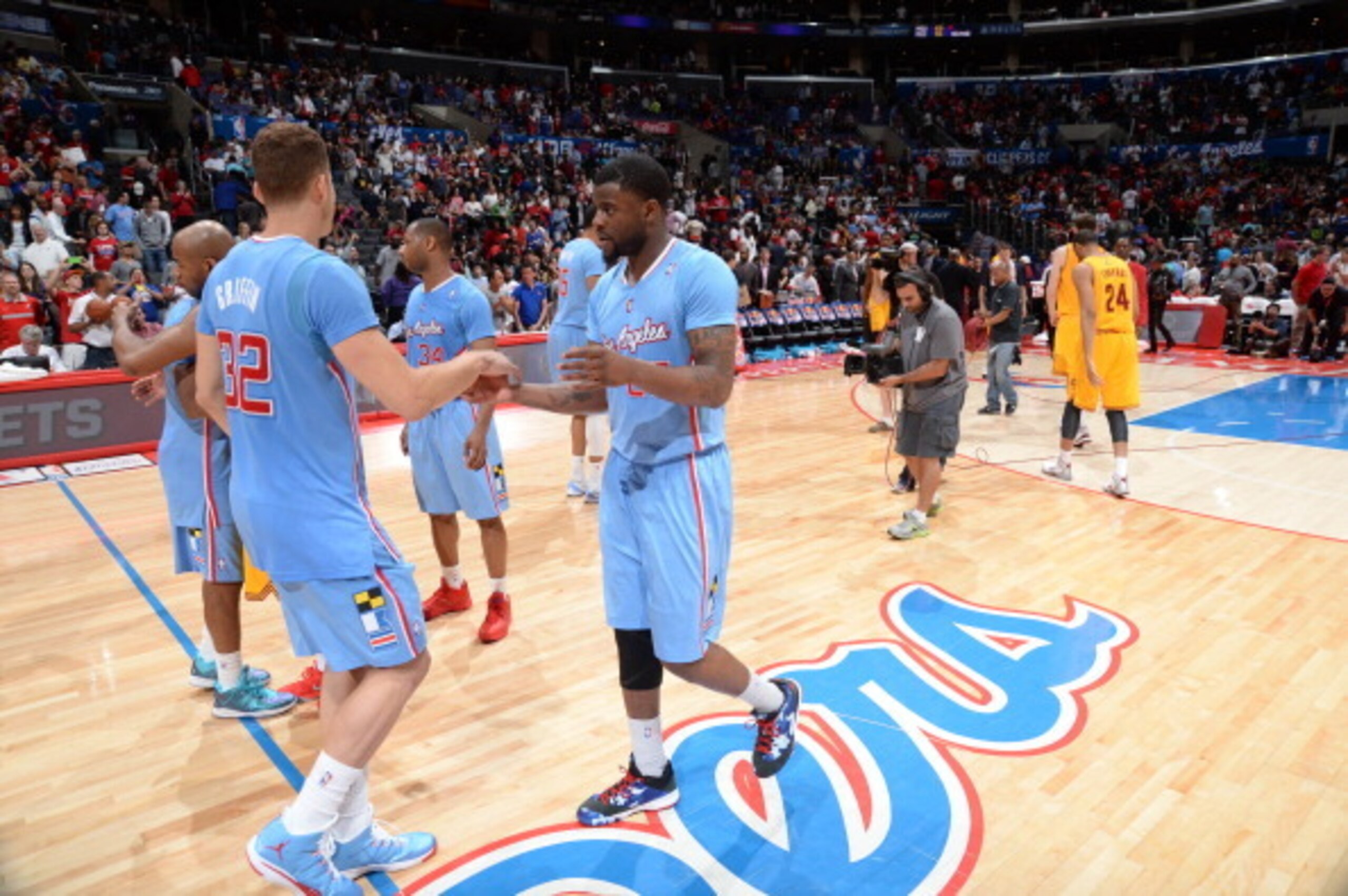 LOS ANGELES, CA - MARCH 16: Blake Griffin #32 and Reggie Bullock #25 of the Los Angeles Clippers celebrate their team's victory over the Cleveland Cavaliers at Staples Center on March 16, 2014 in Los Angeles, California. NOTE TO USER: User expressly ackno LOS ANGELES, CA - MARCH 16: Blake Griffin #32 and Reggie Bullock #25 of the Los Angeles Clippers celebrate their team's victory over the Cleveland Cavaliers at Staples Center on March 16, 2014 in Los Angeles, California. NOTE TO USER: User expressly ackno