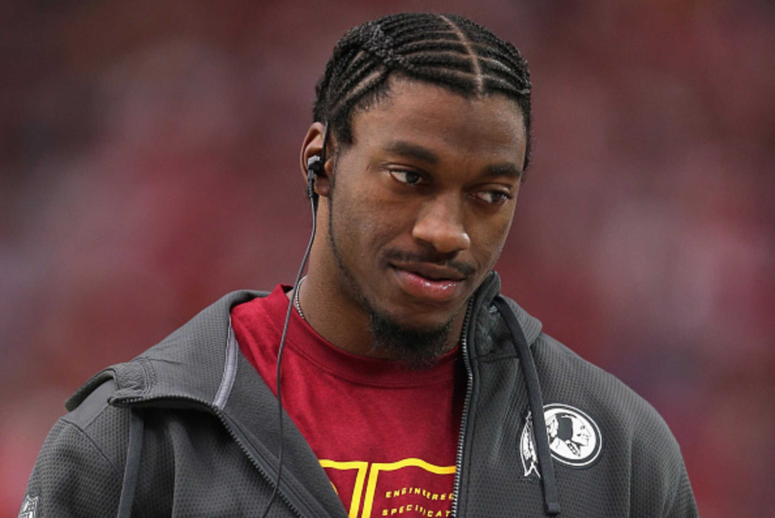 GLENDALE, AZ - OCTOBER 12:  Quarterback Robert Griffin III #10 of the Washington Redskins walks on the sideline during the NFL game against the Arizona Cardinals at the University of Phoenix Stadium on October 12, 2014 in Glendale, Arizona. The Cardinals 