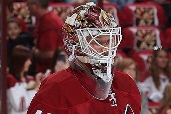 GLENDALE, AZ - OCTOBER 09:  Goaltender Devan Dubnyk #40 of the Arizona Coyotes warms up before the NHL game against the Winnipeg Jets at Gila River Arena on October 9, 2014 in Glendale, Arizona. The Jets defeated the Coyotes 6-2.  (Photo by Christian Pete
