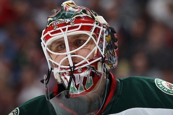 DENVER, CO - APRIL 17:  Goalie Ilya Bryzgalov #30 of the Minnesota Wild looks on as he defends the goal against the Colorado Avalanche in Game One of the First Round of the 2014 NHL Stanley Cup Playoffs at Pepsi Center on April 17, 2014 in Denver, Colorad