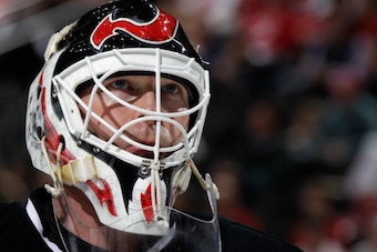 NEWARK, NJ - APRIL 13: Martin Brodeur #30 of the New Jersey Devils takes a break during the game against the Boston Bruins at the Prudential Center on April 13, 2014 in Newark, New Jersey. The Devils defeated the Bruins 3-2. (Photo by Bruce Bennett/Getty 