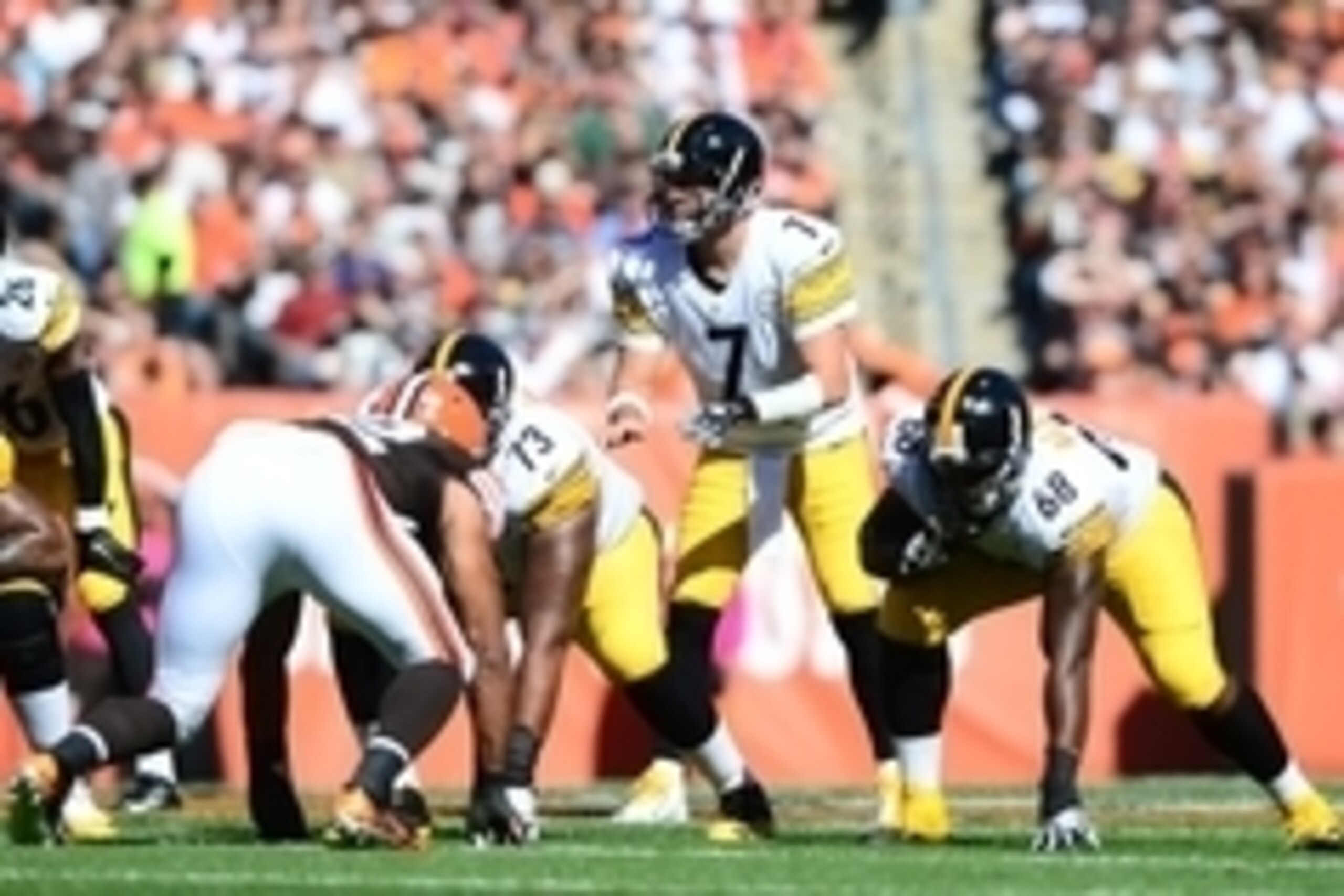 Oct 12, 2014; Cleveland, OH, USA; Pittsburgh Steelers quarterback Ben Roethlisberger (7) takes a snap from center during the first quarter against the Cleveland Browns at FirstEnergy Stadium. Mandatory Credit: Andrew Weber-USA TODAY Sports