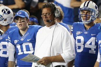 PROVO, UT - SEPTEMBER 21: Offensive coordinator of BYU Cougars Robert Anae calls plays during a game against the Utah Utes during the first half of an NCAA football game September 21, 2013 at LaVell Edwards Stadium in Provo, Utah. (Photo by George Frey/Ge