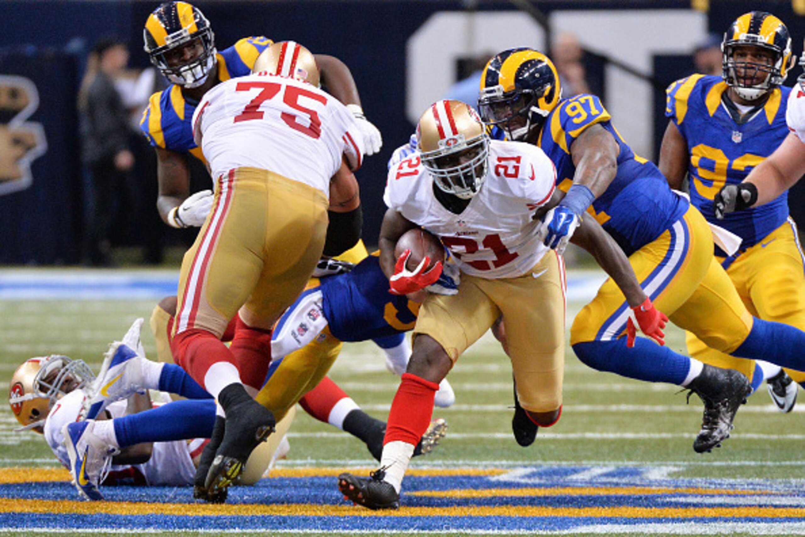 ST LOUIS, MO - OCTOBER 13:   Frank Gore #21 of the San Francisco 49ers carries the ball in the third quarter against the St. Louis Rams at Edward Jones Dome on October 13, 2014 in St Louis, Missouri.  (Photo by Michael Thomas/Getty Images)