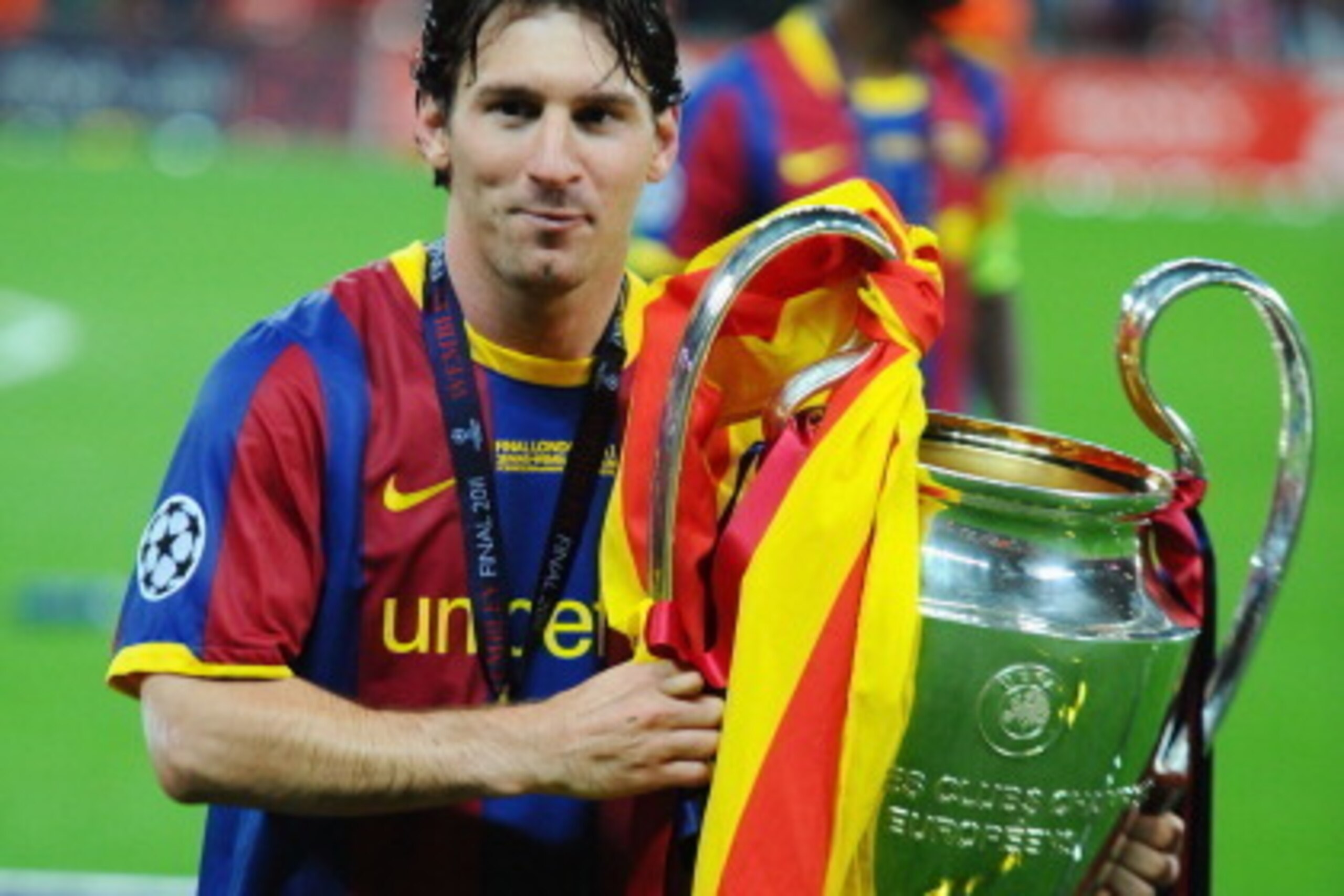 LONDON, ENGLAND - MAY 28:  Lionel Messi of FC Barcelona poses with the trophy after victory in the UEFA Champions League final between FC Barcelona and Manchester United FC at Wembley Stadium on May 28, 2011 in London, England.  (Photo by Clive Mason/Gett