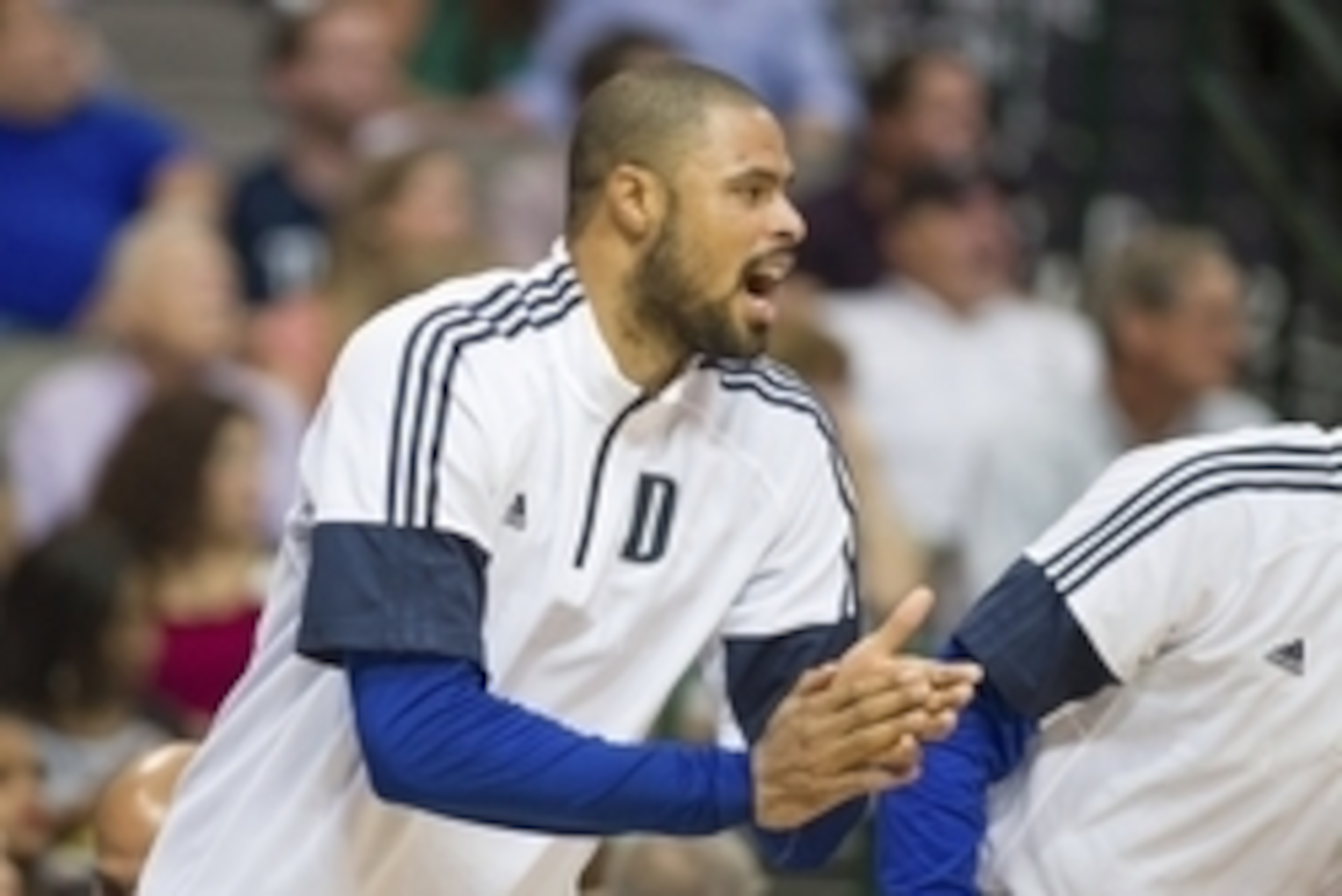 Oct 10, 2014; Dallas, TX, USA; Dallas Mavericks center Tyson Chandler (6) cheers on his team during the second half against the Oklahoma City Thunder at the American Airlines Center. The Thunder defeated the Mavericks 118-109. Mandatory Credit: Jerome Mir