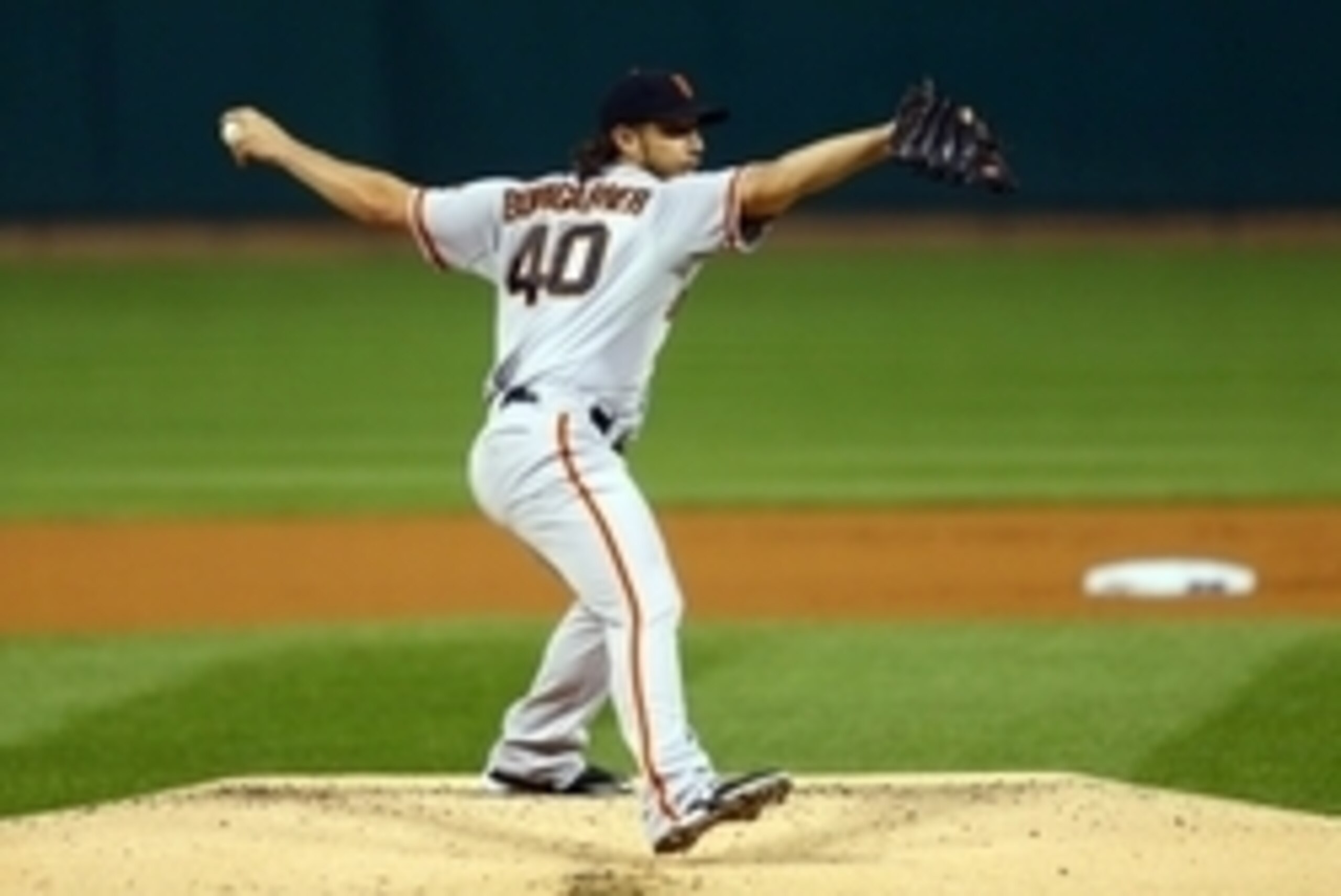 Oct 11, 2014; St. Louis, MO, USA; San Francisco Giants starting pitcher Madison Bumgarner throws a pitch against the St. Louis Cardinals in the first inning during game one of the 2014 NLCS playoff baseball game against the St. Louis Cardinals at Busch St Oct 11, 2014; St. Louis, MO, USA; San Francisco Giants starting pitcher Madison Bumgarner throws a pitch against the St. Louis Cardinals in the first inning during game one of the 2014 NLCS playoff baseball game against the St. Louis Cardinals at Busch St