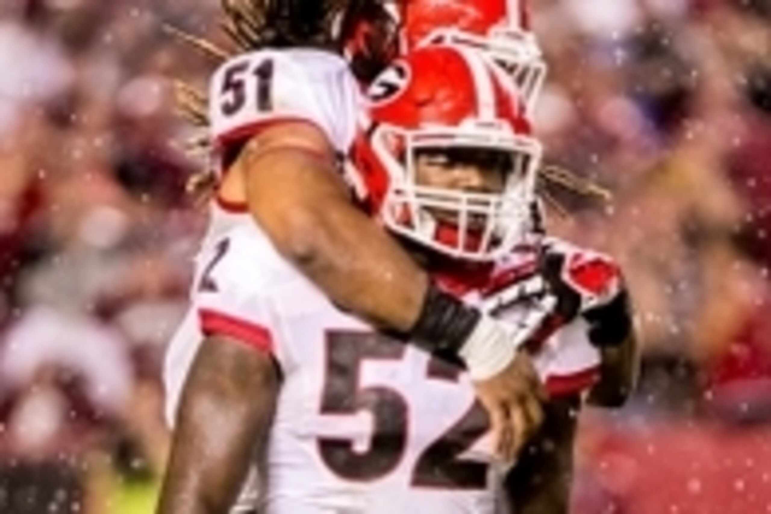Sep 13, 2014; Columbia, SC, USA; Georgia Bulldogs linebacker Amarlo Herrera (52) and linebacker Ramik Wilson (51) celebrate a sack by Herrera of South Carolina Gamecocks quarterback Dylan Thompson (not pictured) in the second half at Williams-Brice Stadiu