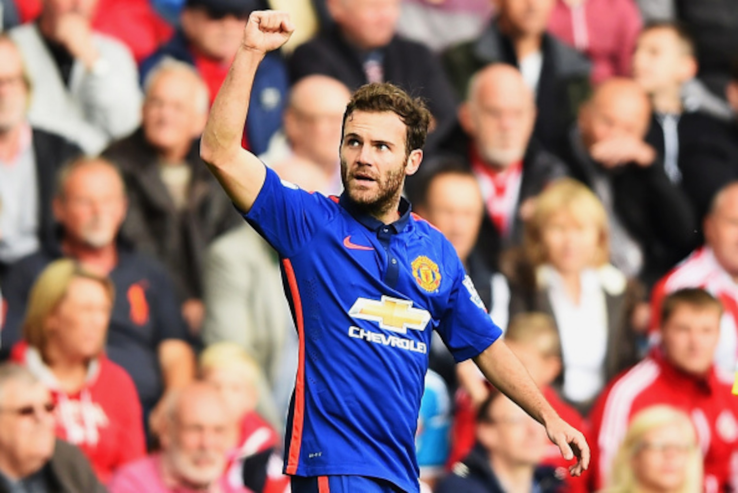 SUNDERLAND, ENGLAND - AUGUST 24: Juan Mata of Manchester United celebrates scoring the opening goal during the Barclays Premier League match between Sunderland and Manchester United at Stadium of Light on August 24, 2014 in Sunderland, England.  (Photo by